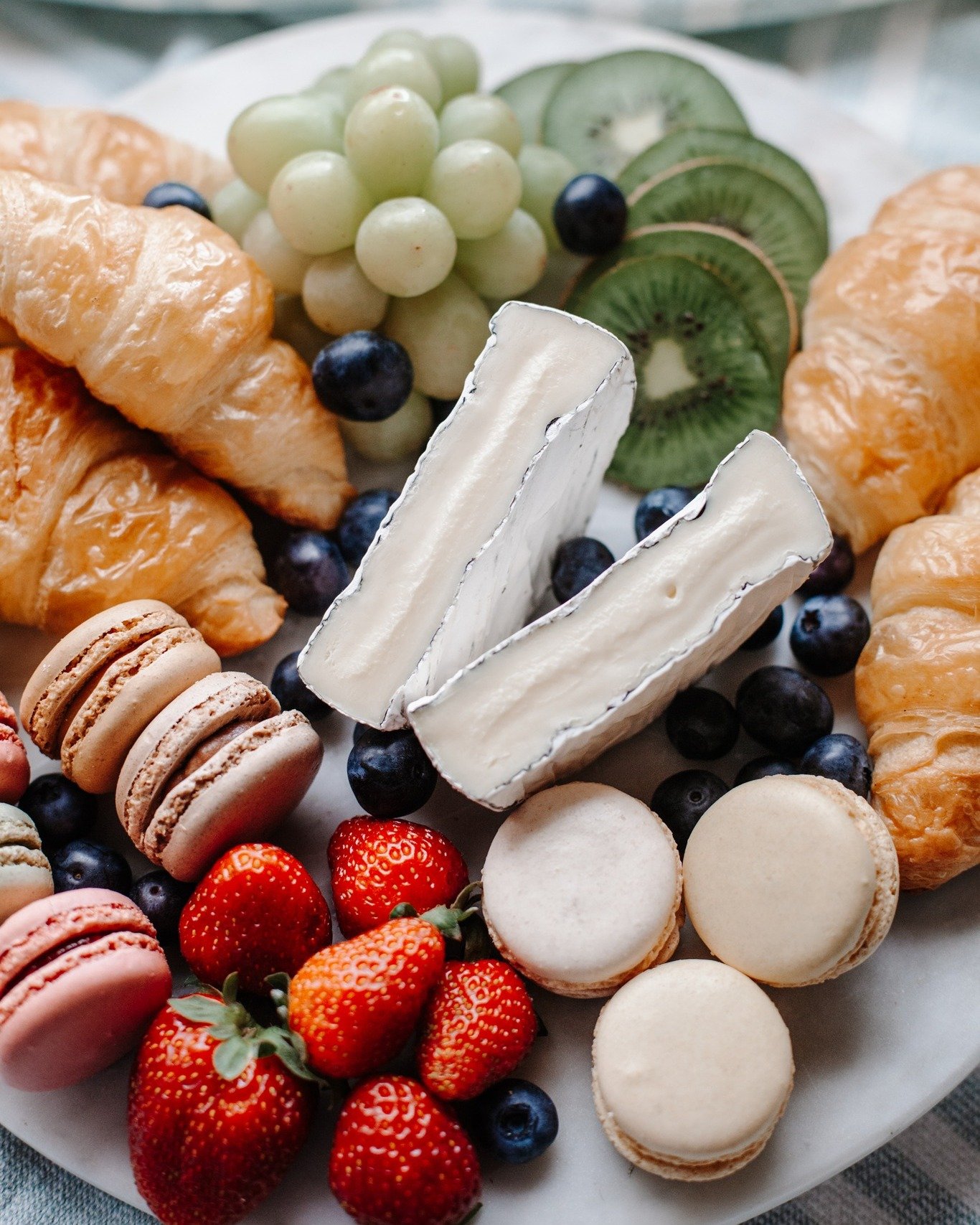 Need a Monday mood lifter? Sweet macarons, creamy brie and buttery croissants should do the trick