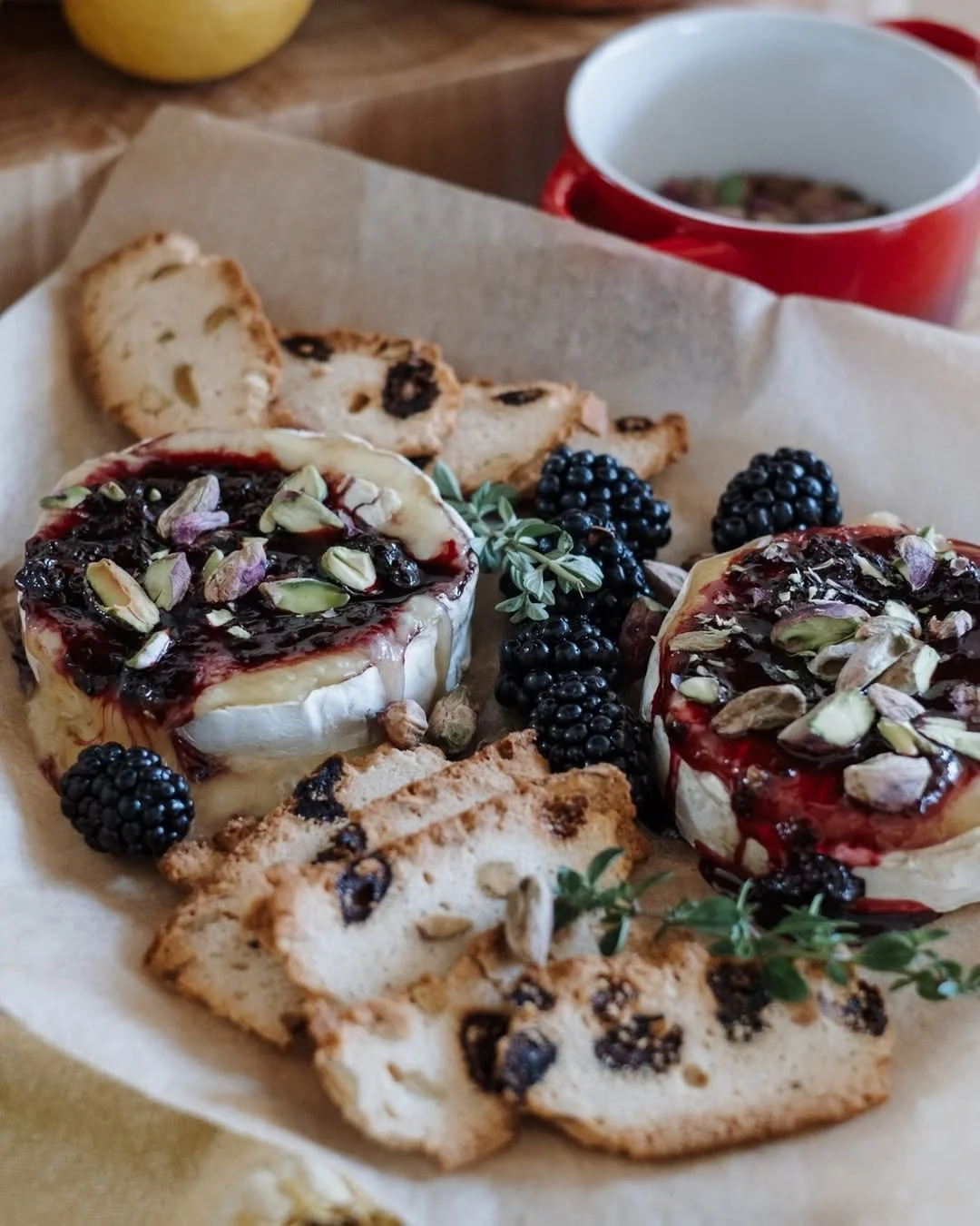 Creamy baked brie topped with blackberry and pistachios. No need to say more.