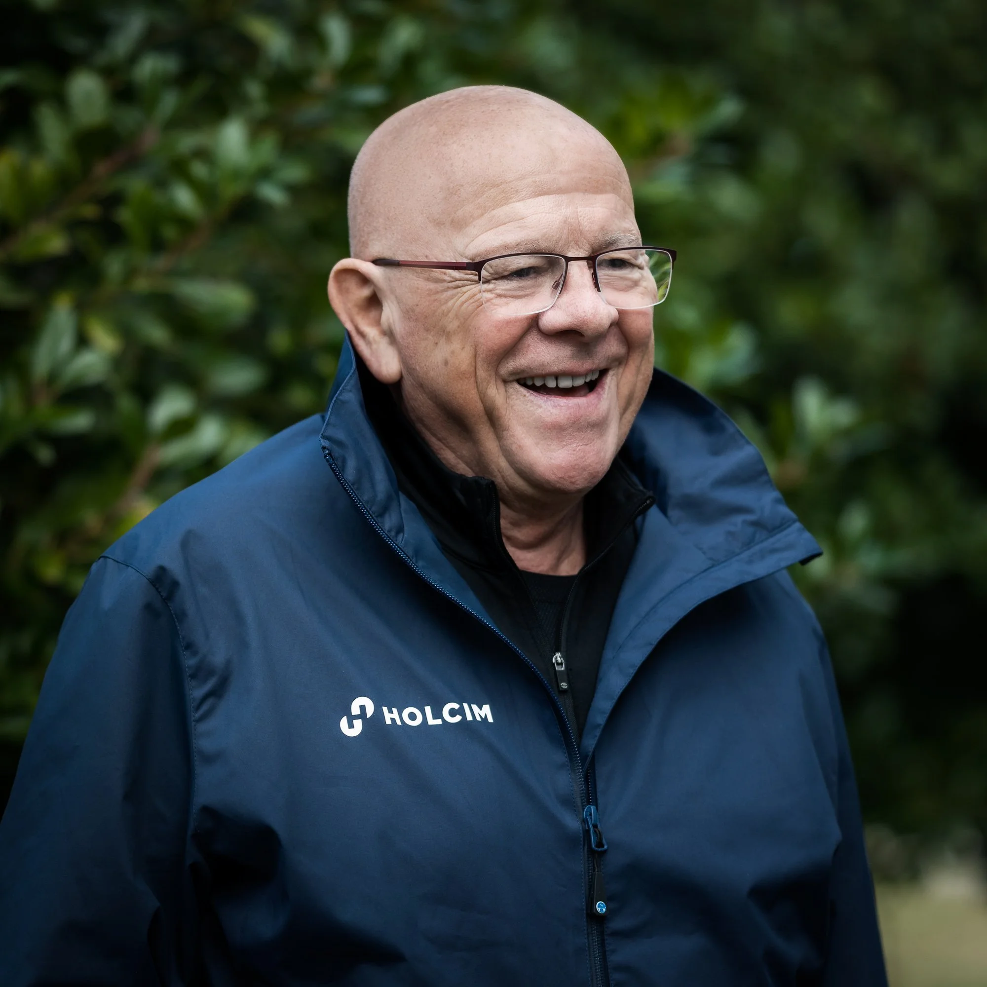 Environmental portrait of a global corporate leader photographed on location, conveying experience, credibility and trust.