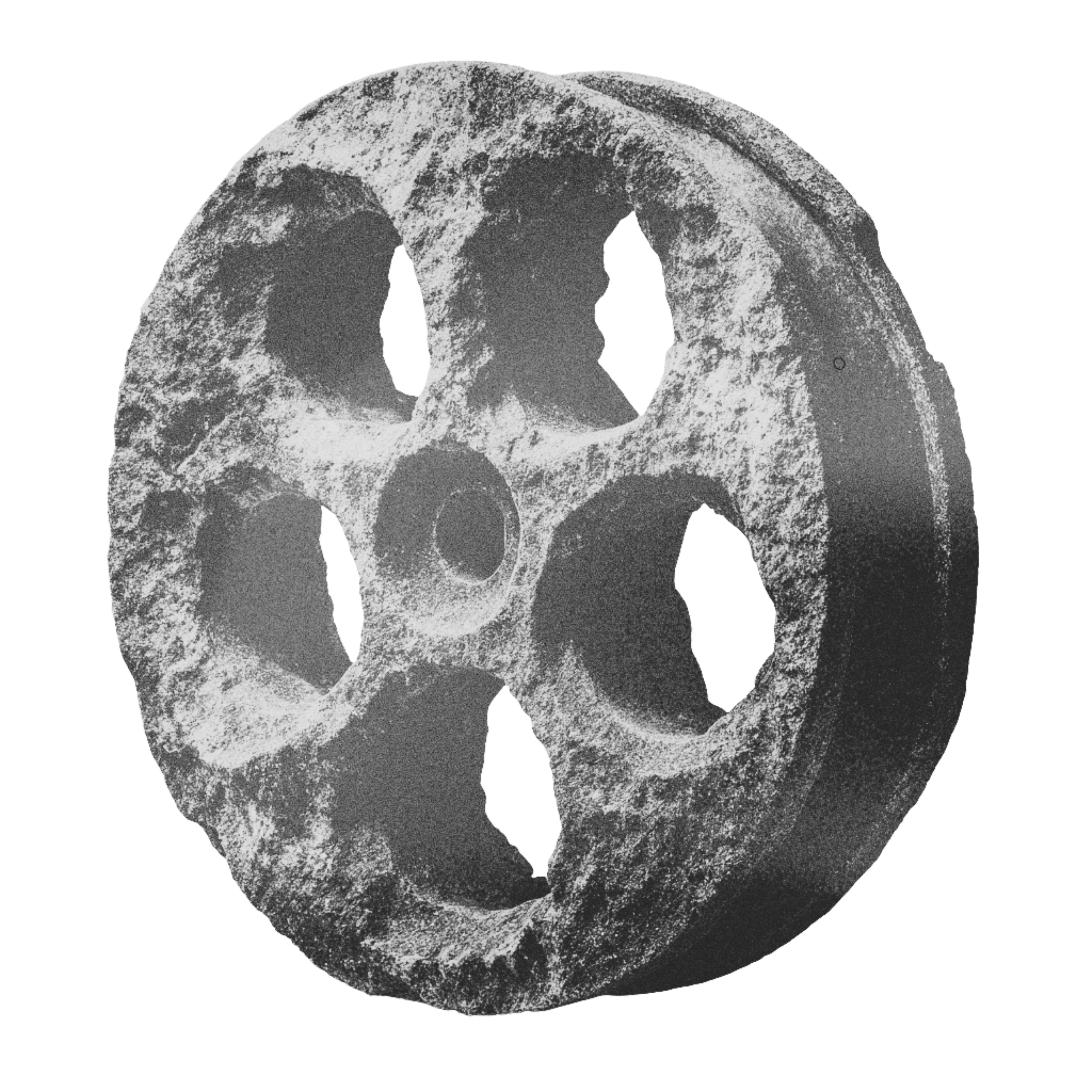 A black and white photograph of a film reel canister, made to look like a archeological artefact, displaying its pattern of holes and texture.
