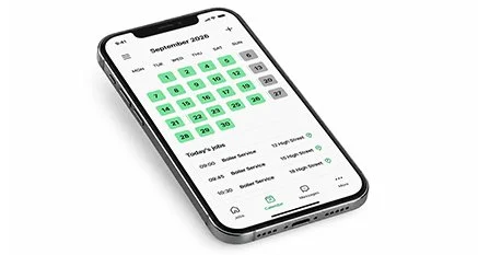 Smartphone displaying a September 2023 calendar with highlighted booking dates.