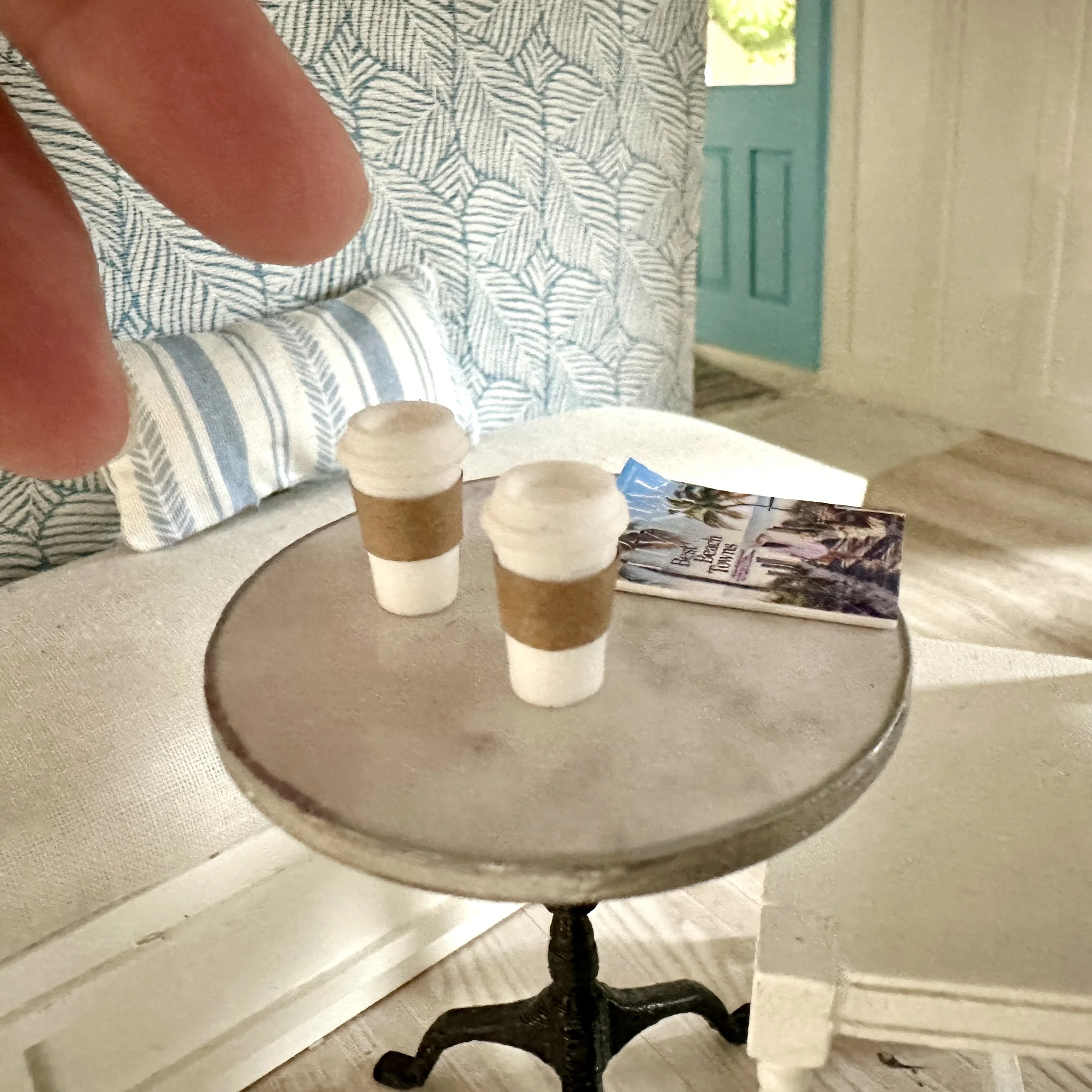 Miniature takeout coffee cups