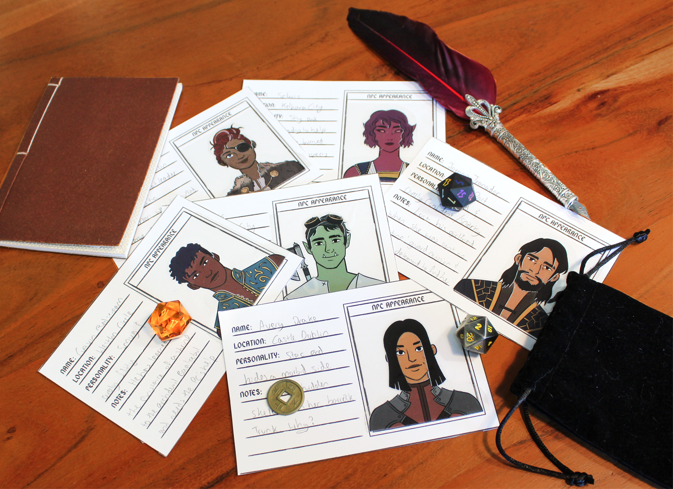 Collection of character sheets with illustrated NPC characters, a red feather quill, dice, and a small black bag on a wooden table, used for role-playing games.