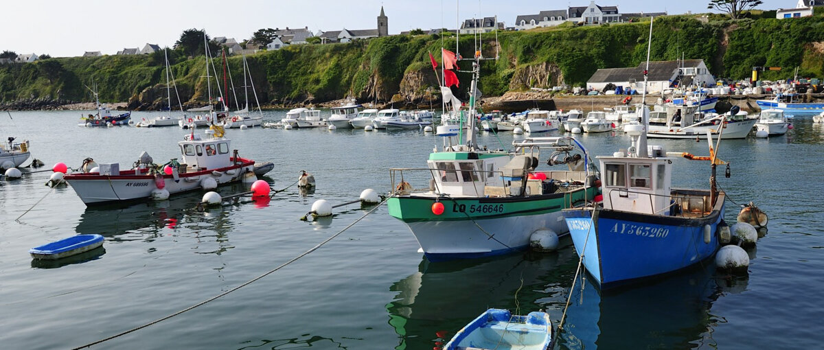 Colourful fishing boats in the port of Saint-Gildas on the island of Houat