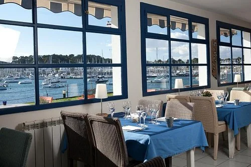 The dining room at Le Chantier restaurant, overlooking the harbour at La Trinité-sur-Mer