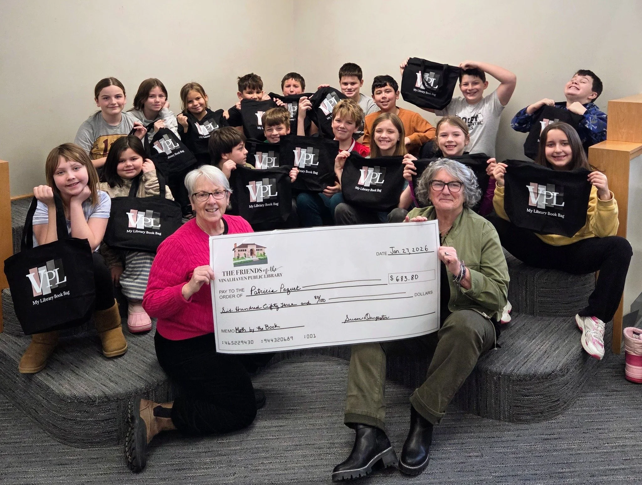 Last week, we went to The Vinalhaven School to encourage PreK-5th grade students to sign up for library cards. We handed out book bags, library card applications, and bookmarks (the bookmark was designed by their art teacher!). The kids were very exc