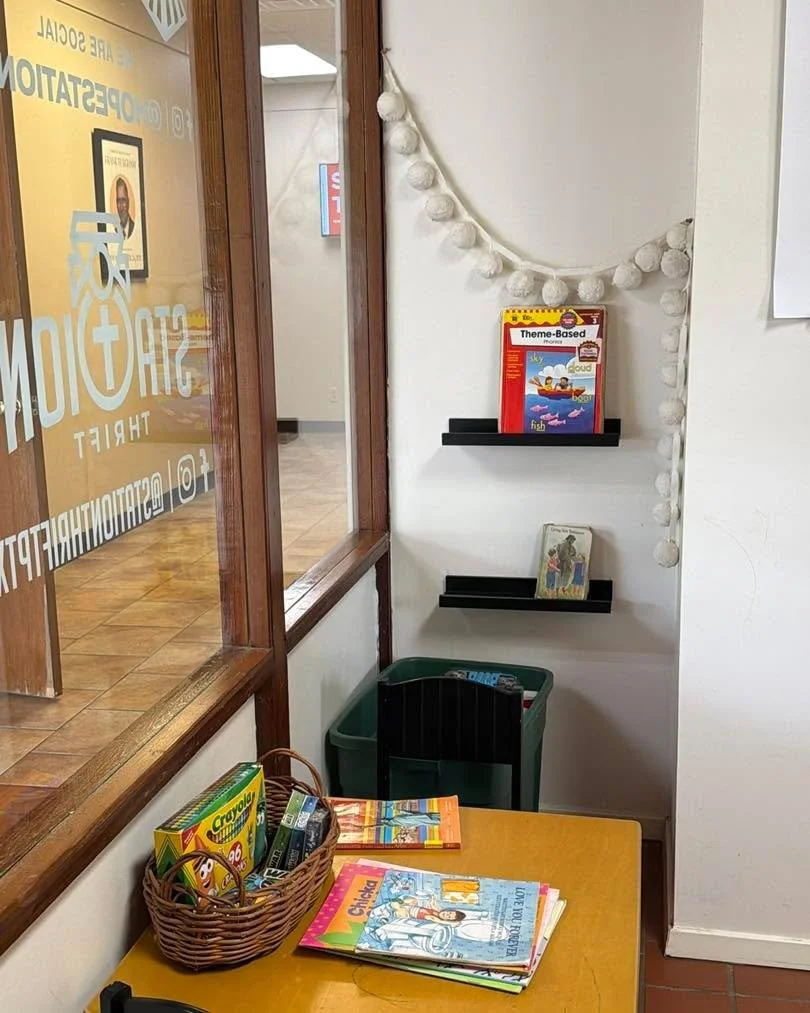 Hope Station serves entire families, not just immediate needs. 🤍

That&rsquo;s why spaces like this matter.
A small table. Crayons. Books. A quiet corner for children while parents meet with staff, do laundry, receive assistance, or simply take a br