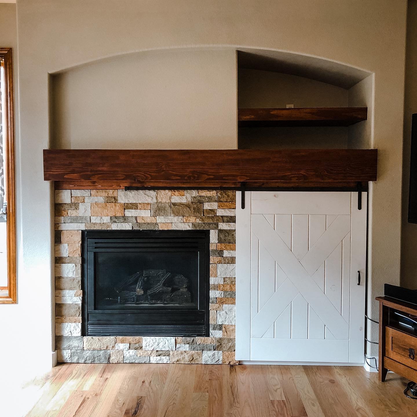 living room beam and barndoor.jpeg