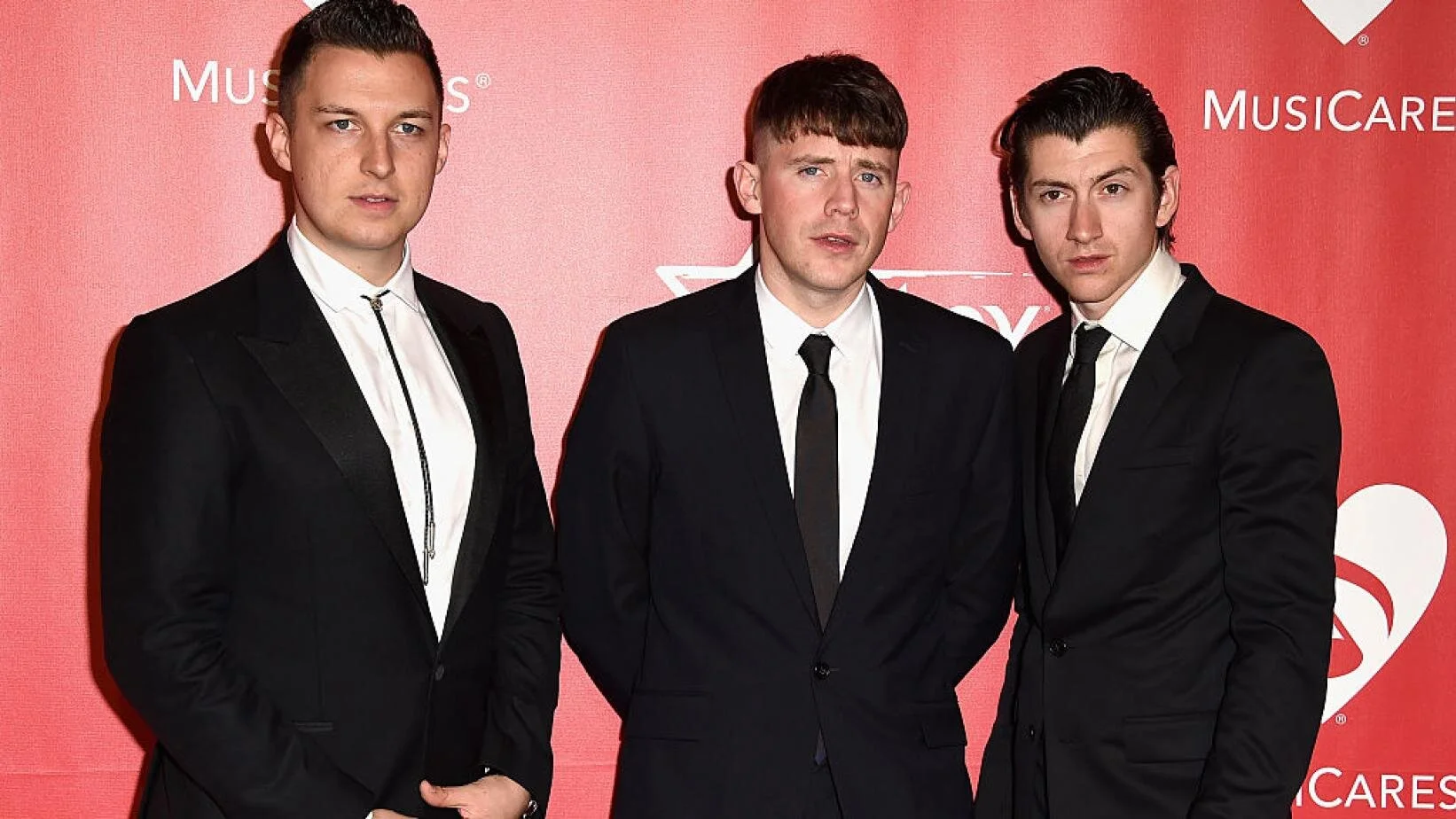 Let Arctic Monkeys' Inspire Your  Wardrobe | GRAMMYS