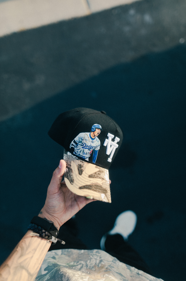 LA black with camo bill / player print on front