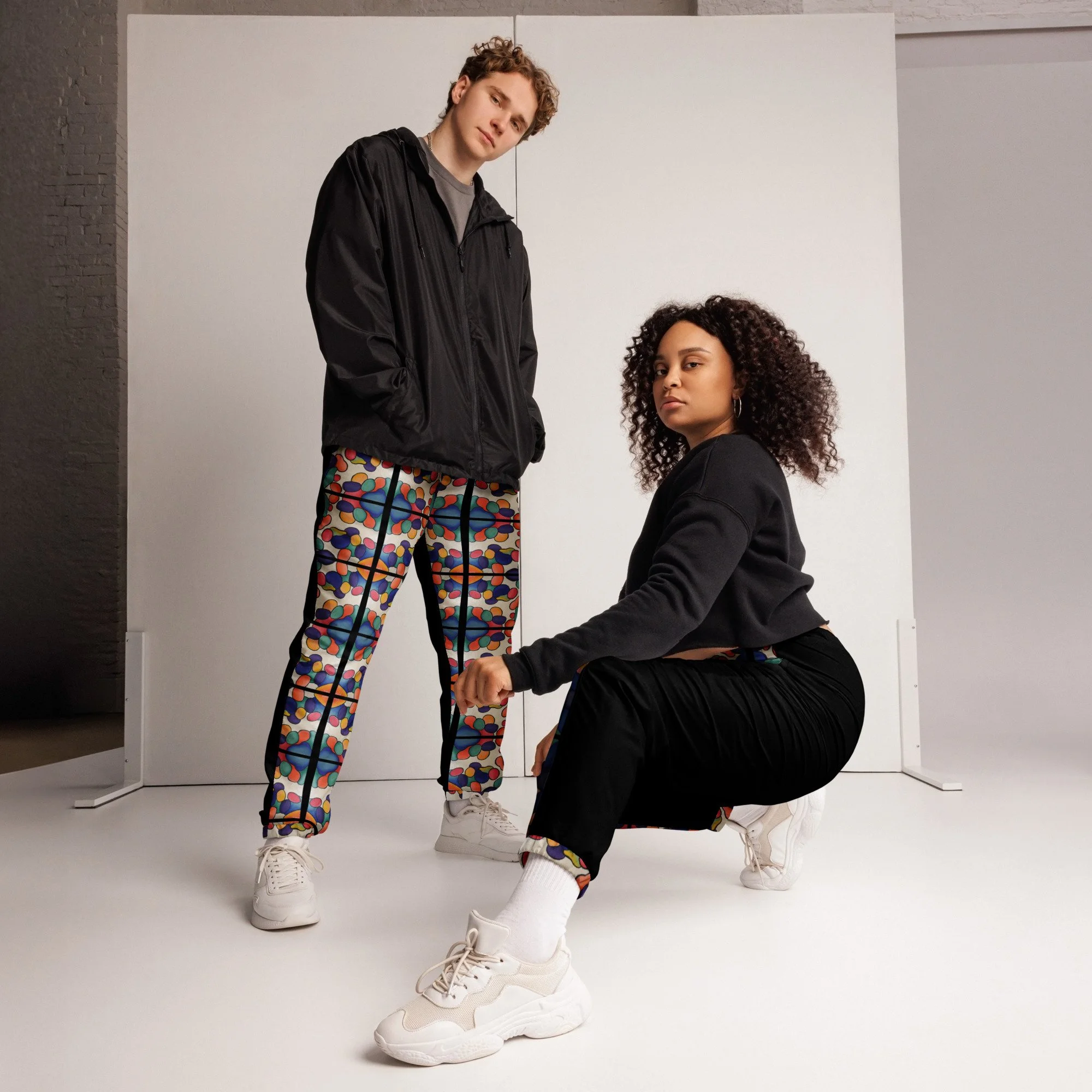 all-over-print-unisex-track-pants-black-front-66fdee51a757f.jpg