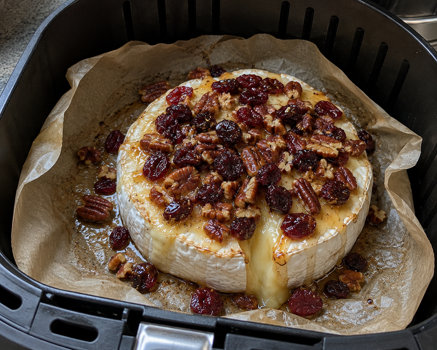 Air Fryer Baked Brie with Cranberries, Pecans, and Honey