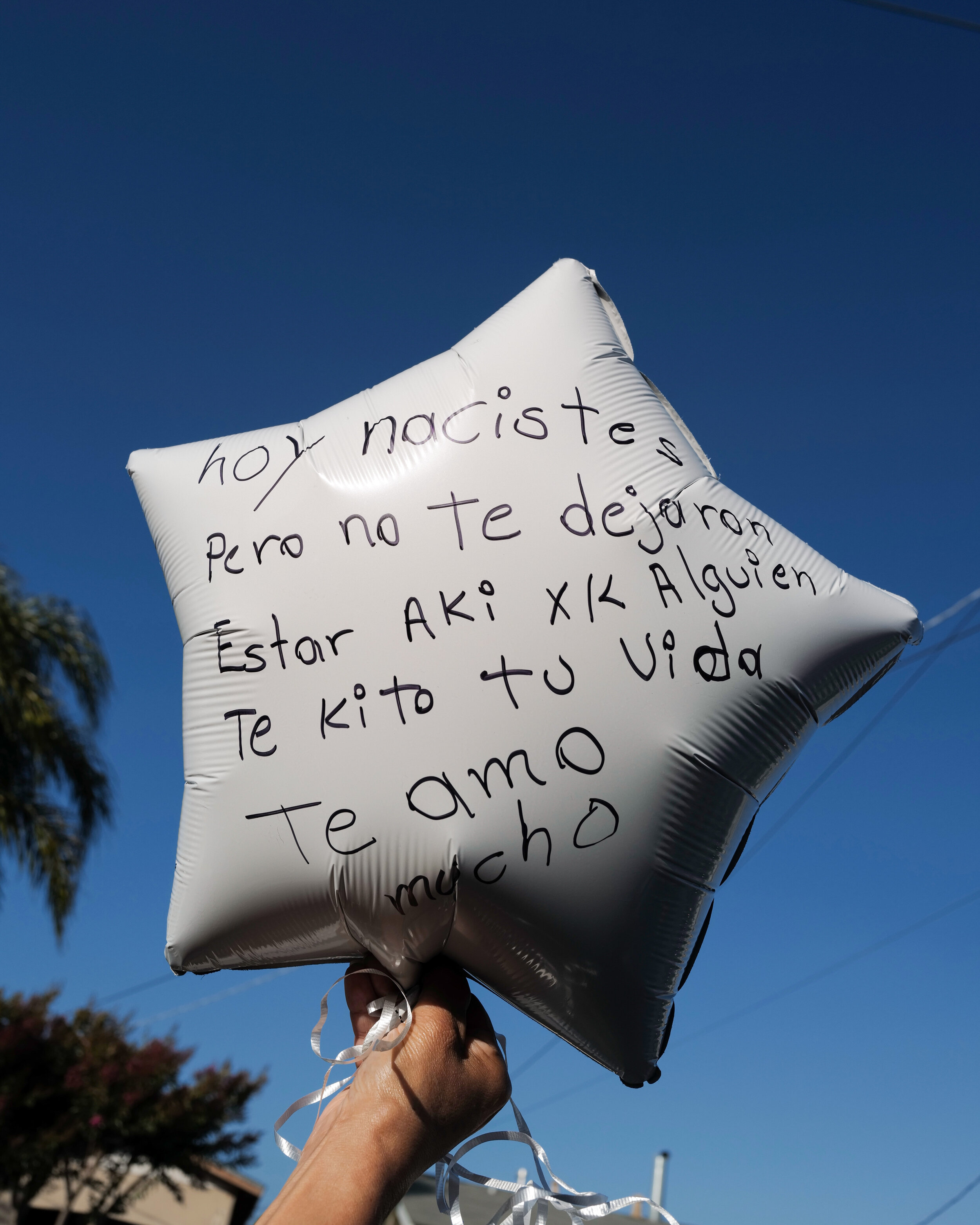  The mother of Erik Salgado holds a balloon for him on what would have been his 24th birthday. Erik Salgado was killed on June 6, 2020 by California Highway Patrol when they fired 40 shots into his car, injuring his pregnant girlfriend and causing he