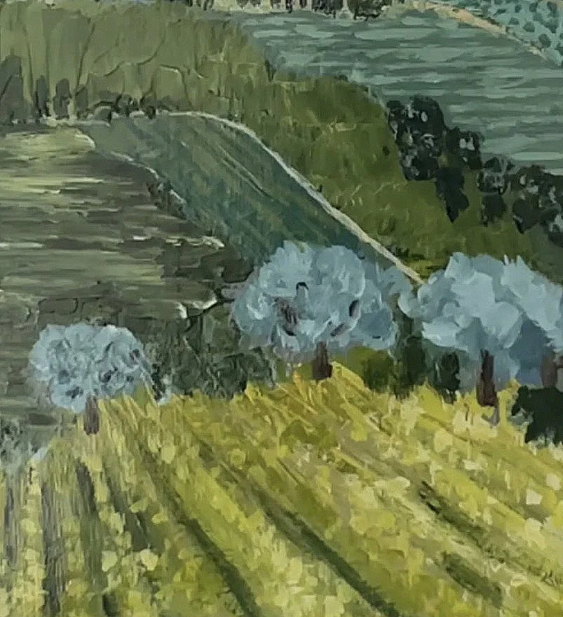 Close-up detail of green paint in a Tuscan countryside landscape.