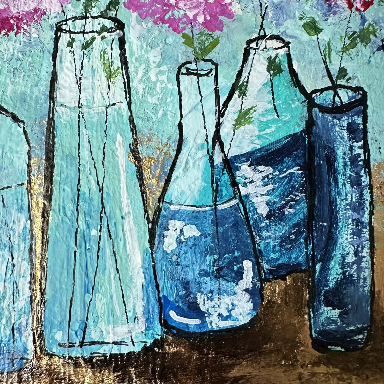 Close-up of a the vases in pink floral painting.
