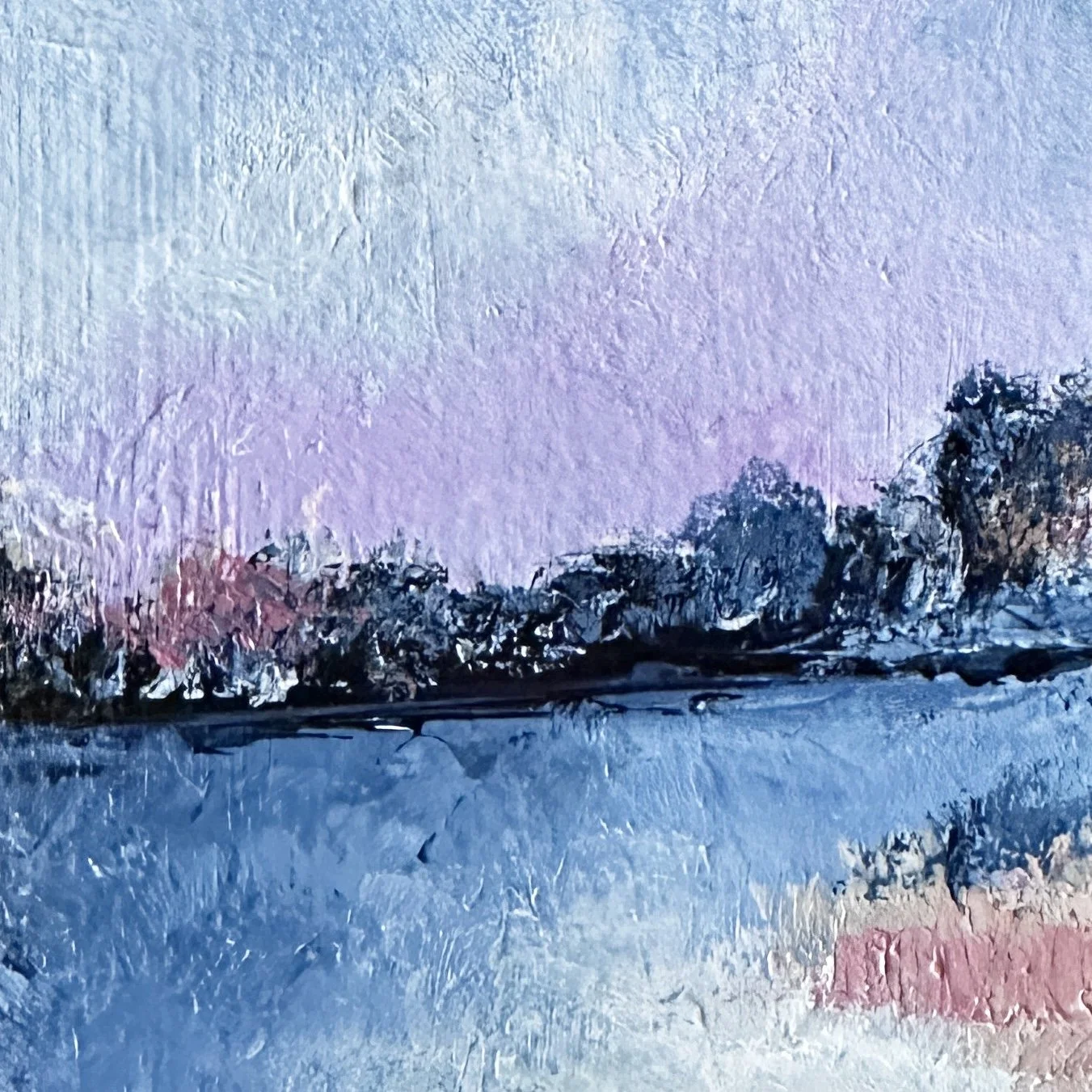 Close-up of expressive acrylic brushwork forming the tree-lined shoreline in an abstract landscape painting.