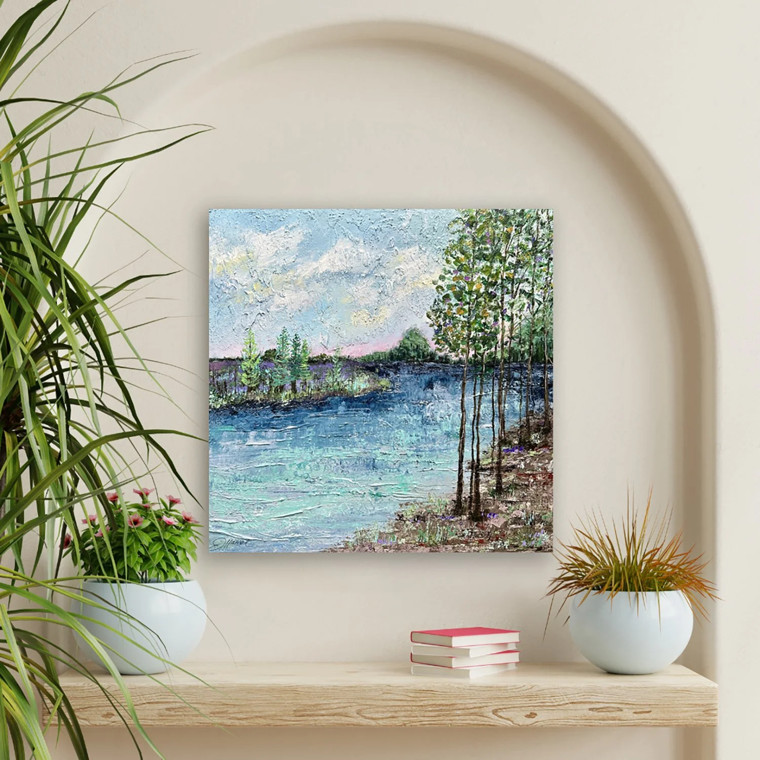 Skip-a-Stone-landscape-painting-above-a-shelf.jpg