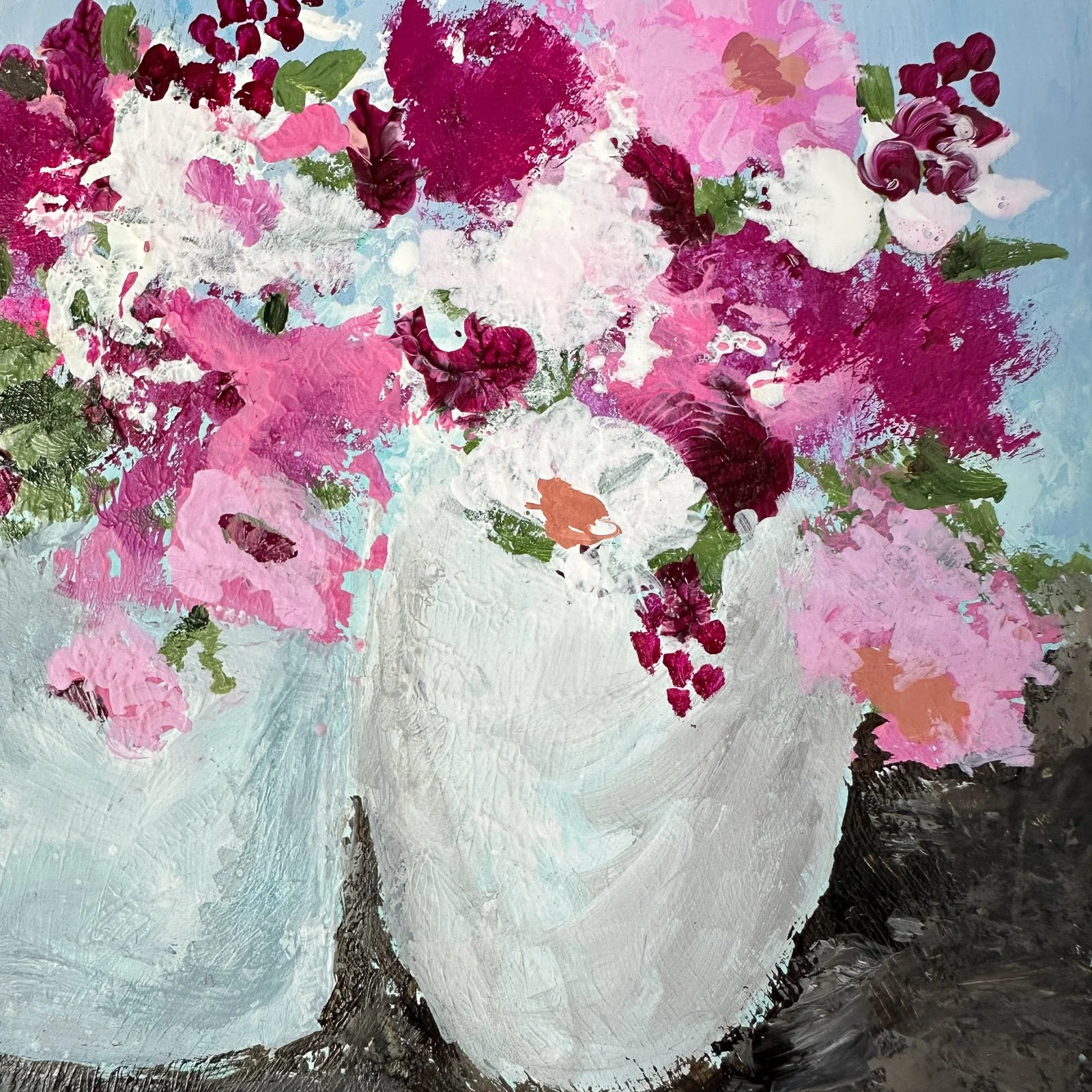 Close-up details of pink and magenta floral painting