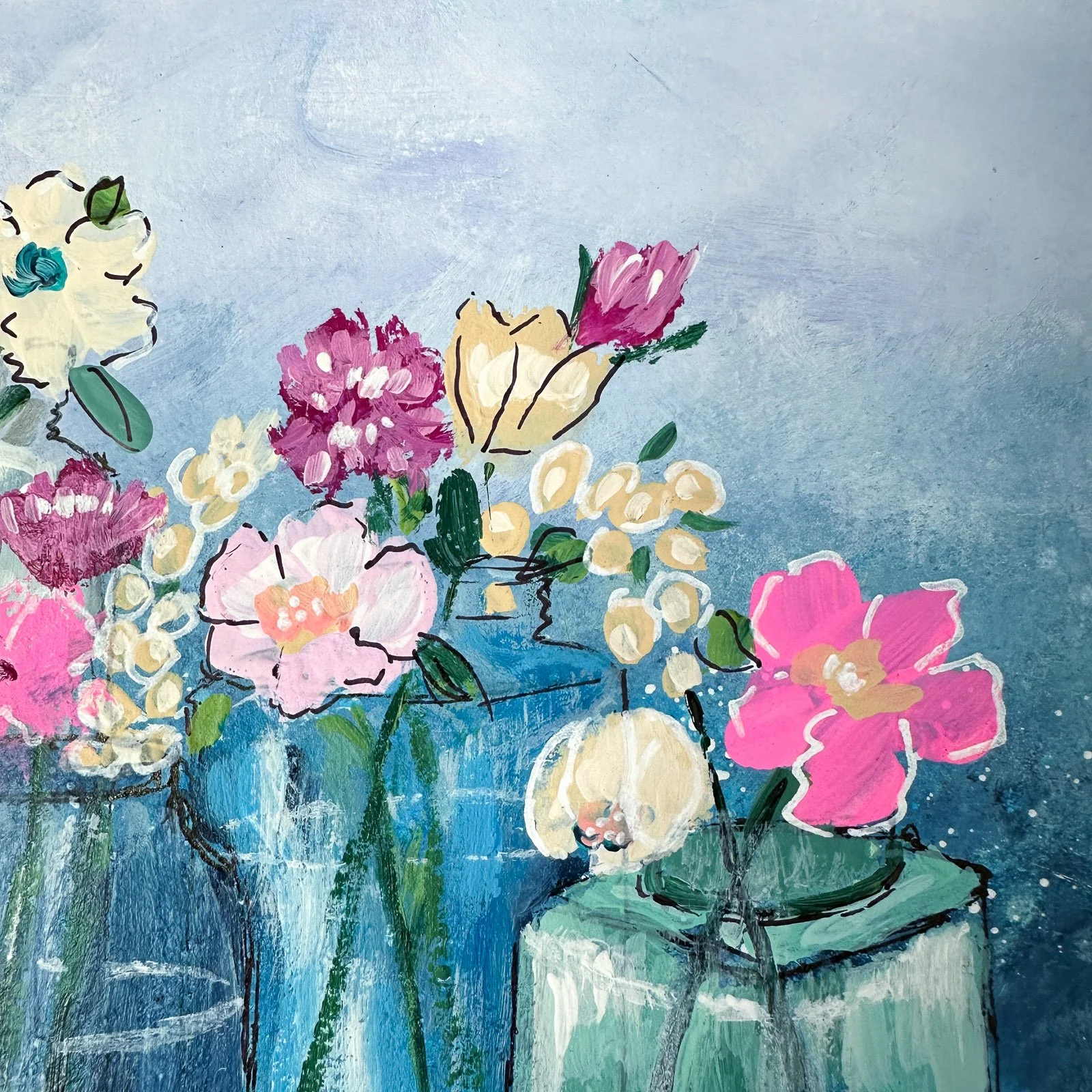 Close-up view of a brightly, colored floral painting.