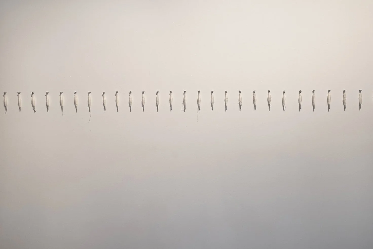 'Site wound' (installation view), 2025
Hand-spun silk with galvanised steel.
31 pins; each approximately 15 x 3 x 3cm.
Image courtesy of Justine Roche. Exhibited as part of the 'Present/Place' exhibition at Tamworth Regional Gallery, NSW. 