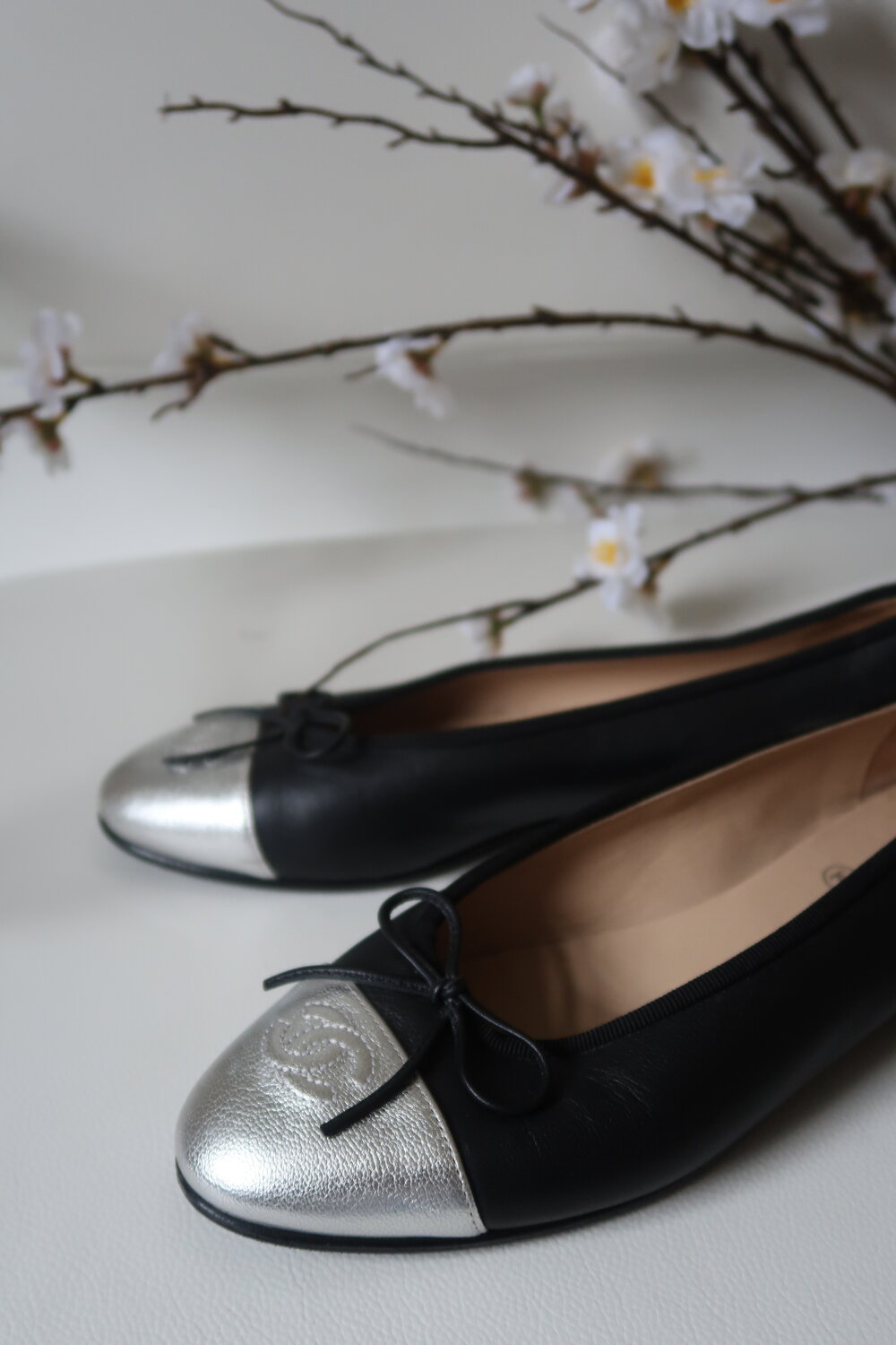 Chanel Black Leather & Silver Toe Cap Ballet Flats, Size 38