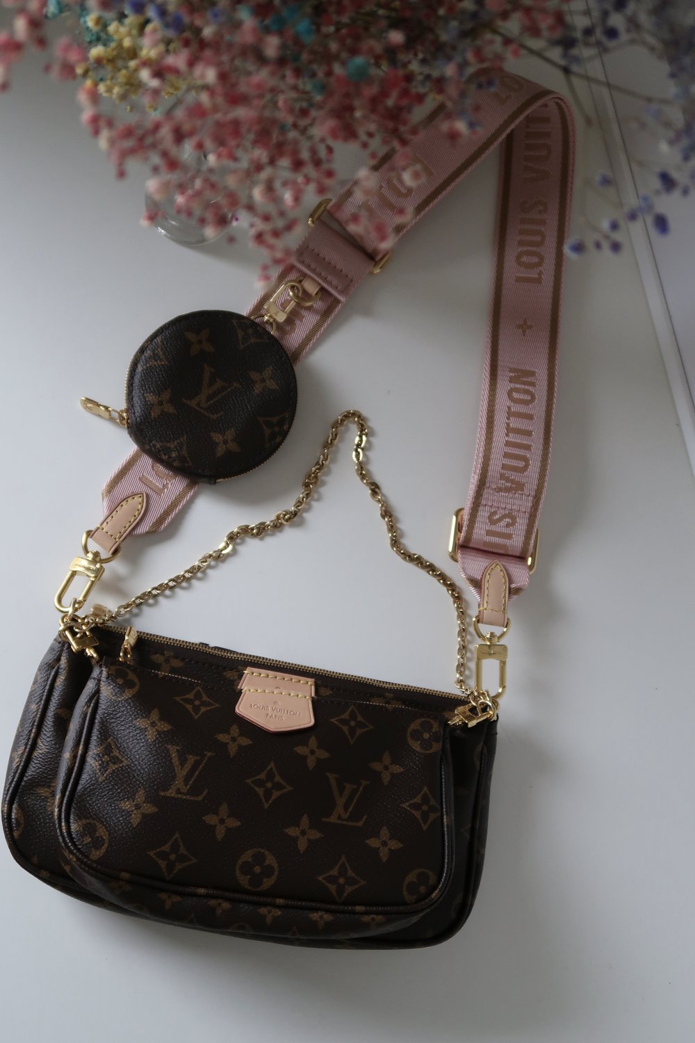 Louis Vuitton Multi Pochette in Monogram Canvas with Pink Strap - Bags from  David Mellor Family Jewellers UK