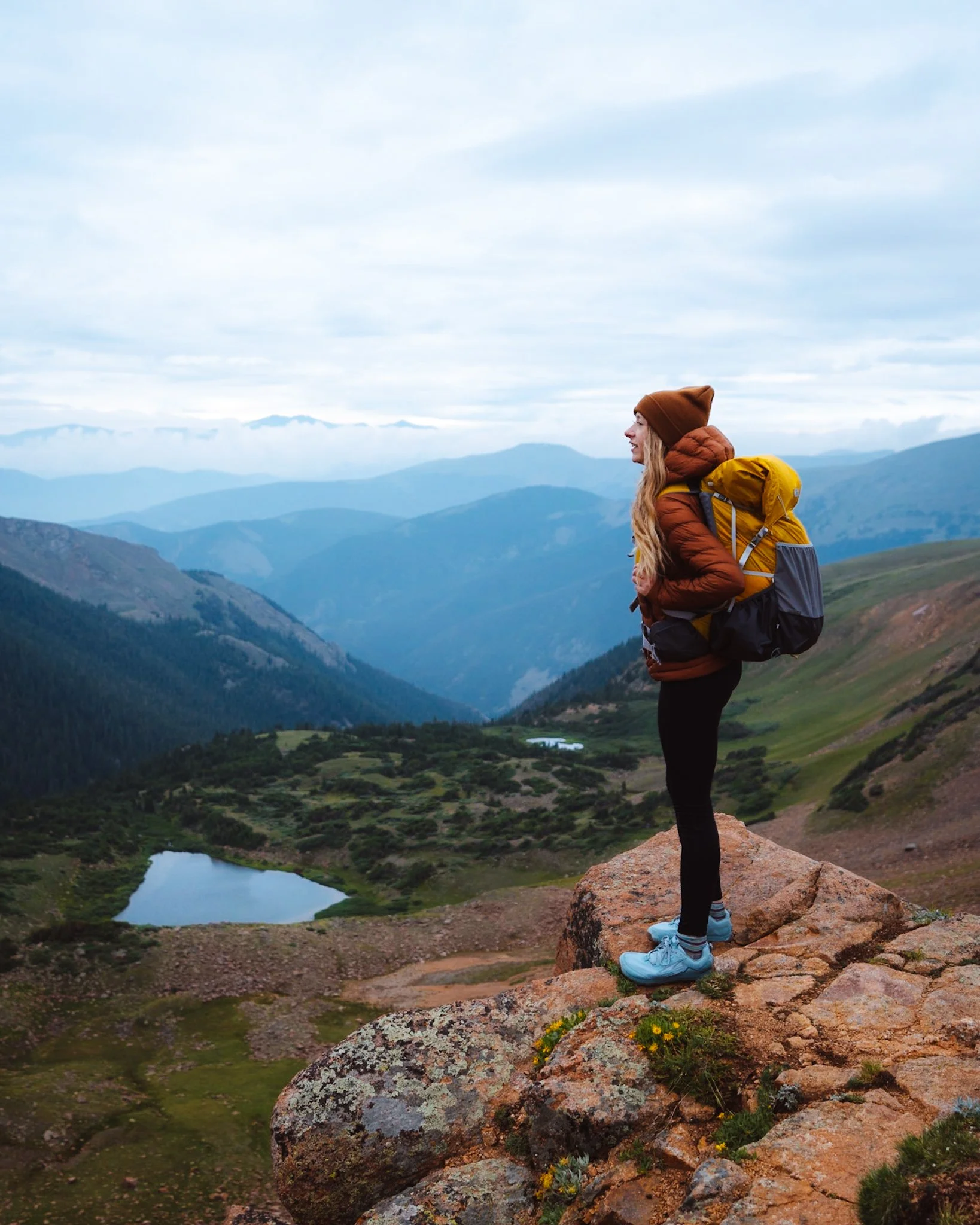 Wearing Women's Hiking shoes, Altra Lone Peak Trail Running Shoes, hiking in the Rocky Mountains in Colorado.