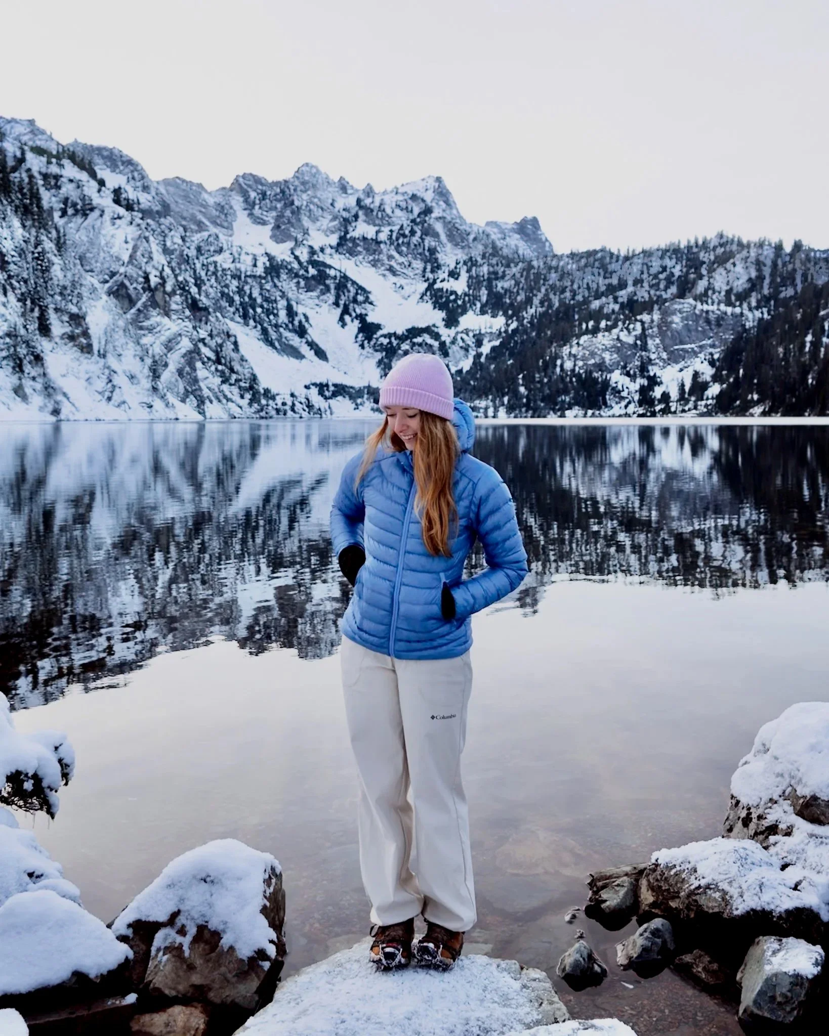 Erin hiking in winter in Washington State wearing Columbia women's hiking pants.