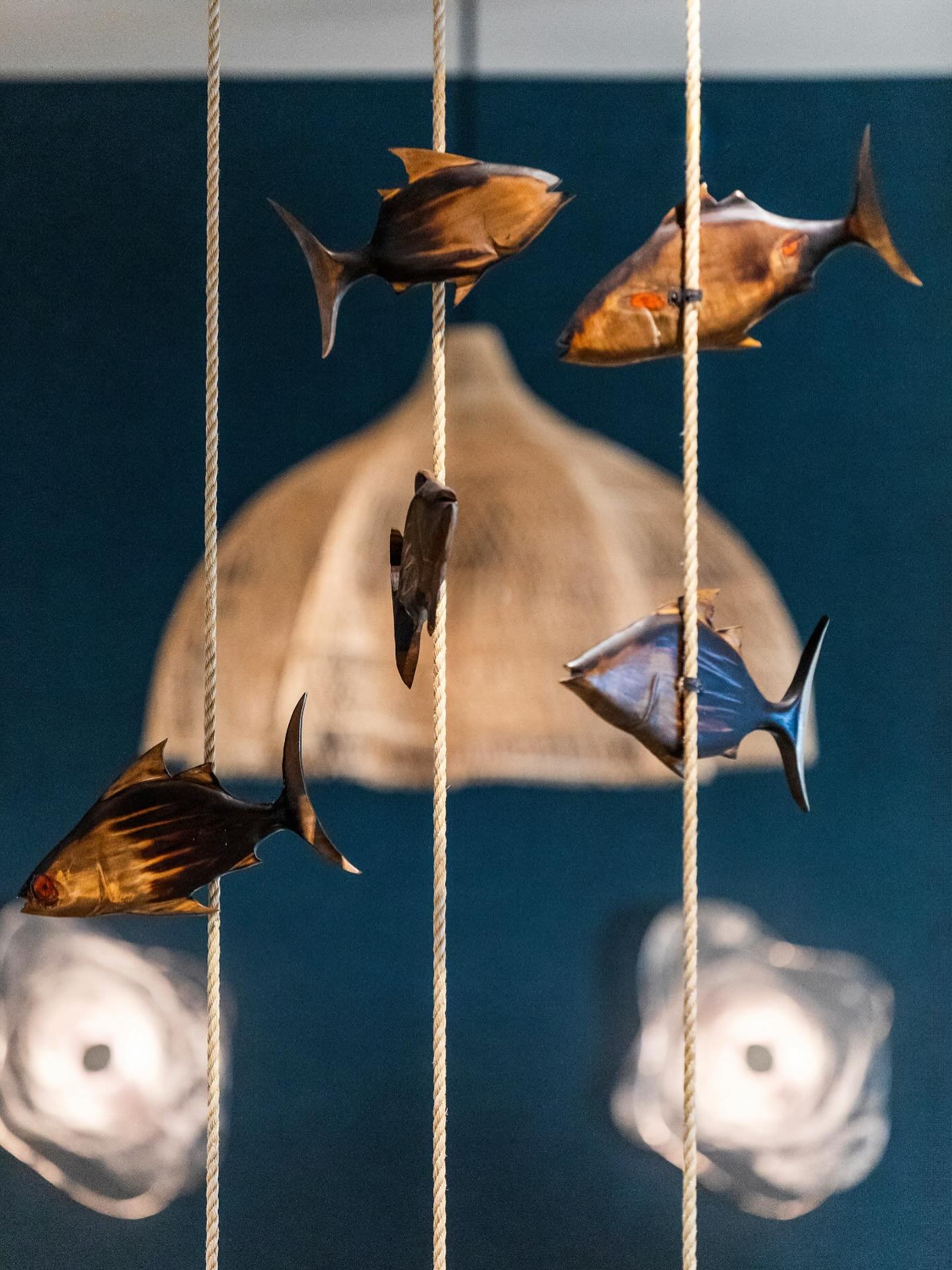 🐟CARVED // Swimming into the weekend like&hellip;these hand-carved wood fish!! Custom made beauties for the lobby of our Hawaii project by artist Tevita. Installed as a school, they resemble fish gathered in a hukilau net, a traditional practice tha