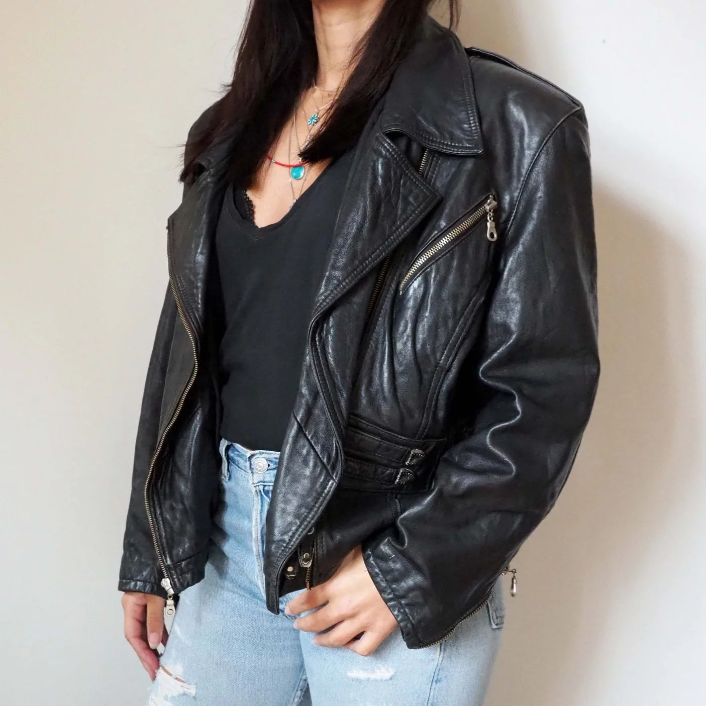 BLACK LEATHER OVERSIZED JACKET WITH CONCHO DETAIL