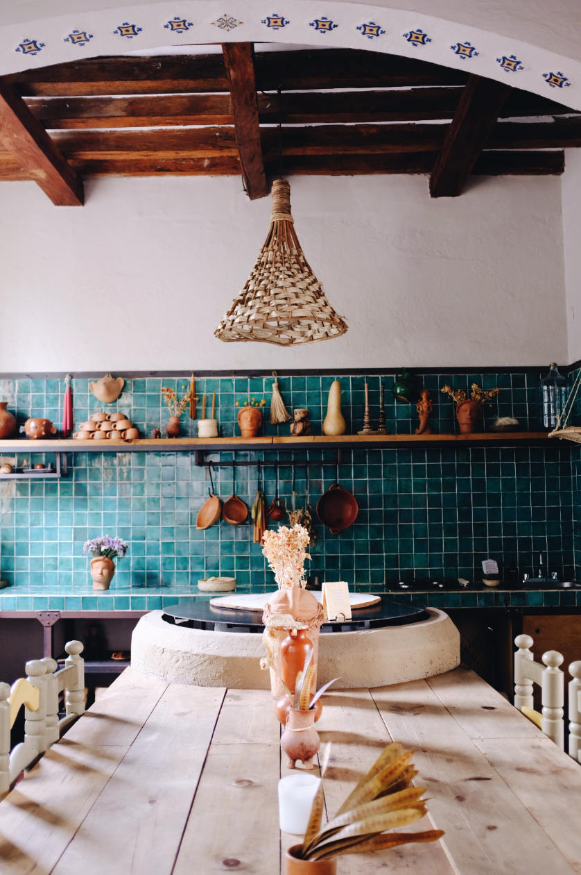 Hotel-Weekend-Barefoot-Luxury-Grana-B&B-Oaxaca-Kitchen-Pottery-flowers.png