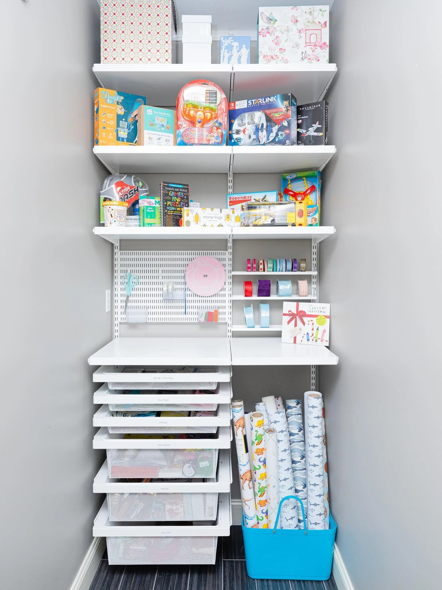 Tis the season 🎁 we have three birthdays in November and Christmas on the horizon, it&rsquo;s time to get that gift wrap storage under control.

We used Elfa from @thecontainerstore to create this amazing wrapping station. Swipe all the way to see t