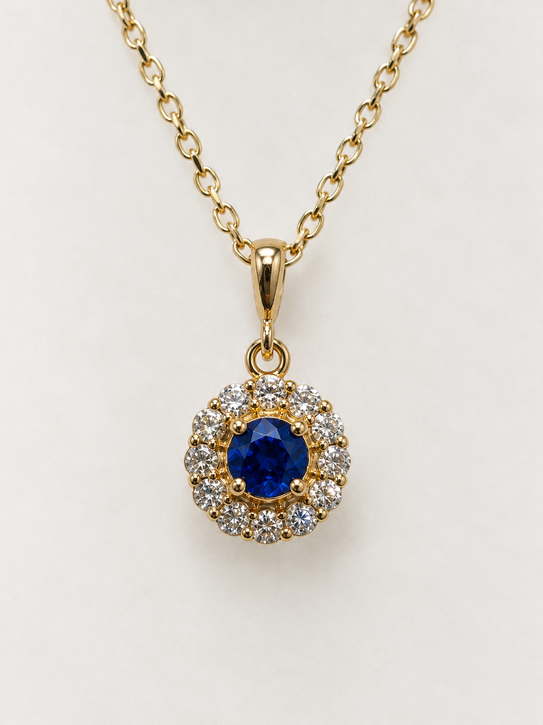 Sapphire Diamond Halo Pendant.png
