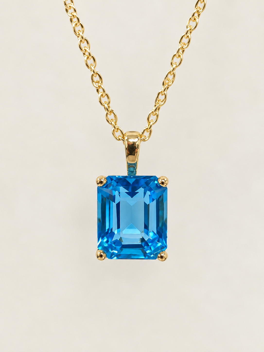 14K Yellow Gold Blue Topaz Pendant