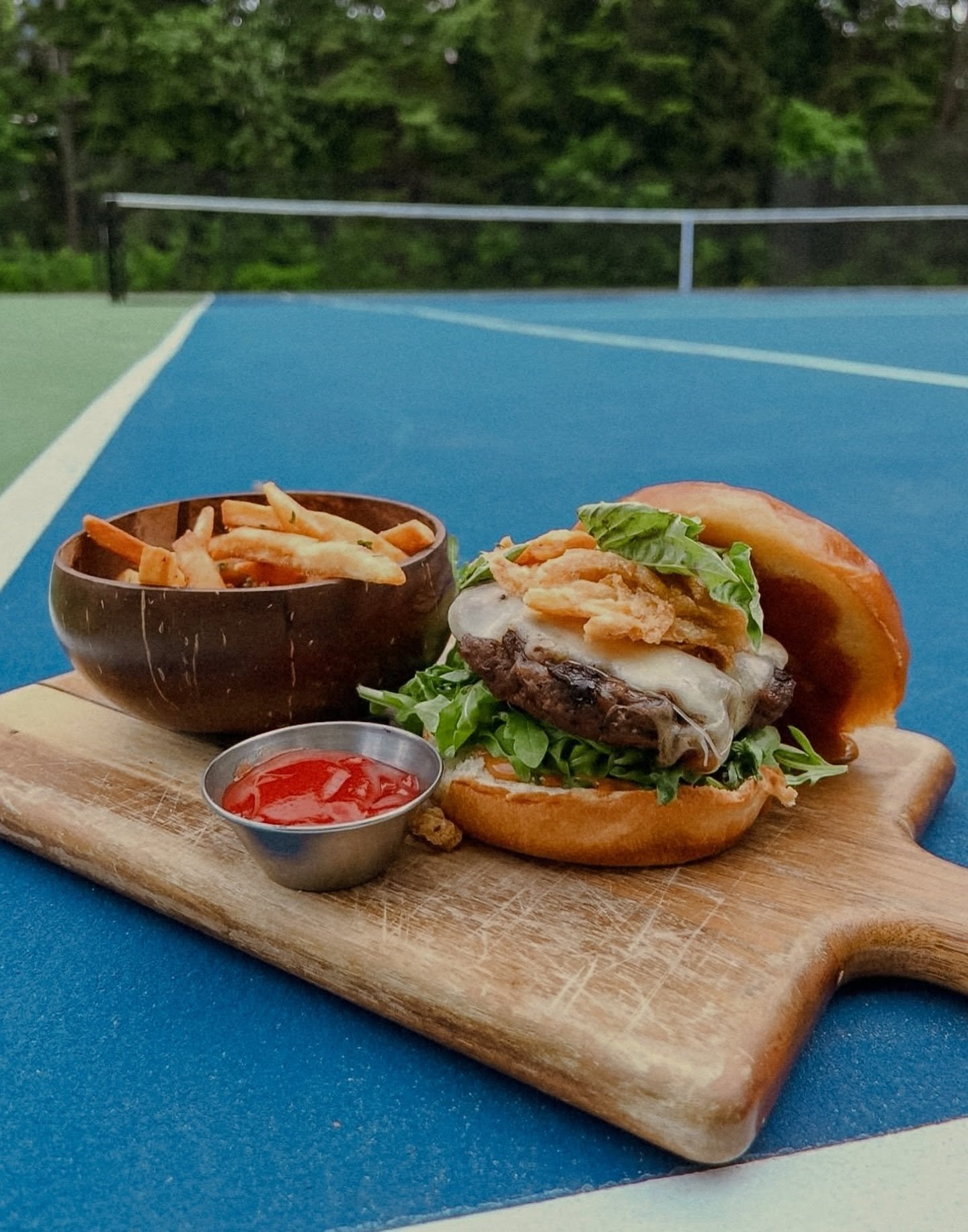 Okay but has anyone told you about the caf&eacute; and bar at the Whistler Racket Club? 👀

Full restaurant, killer patio, happy hour every single day from 4&ndash;6PM, $6 drinks, truffle fries, flatbreads + so much more.

Open every day, weekends fr