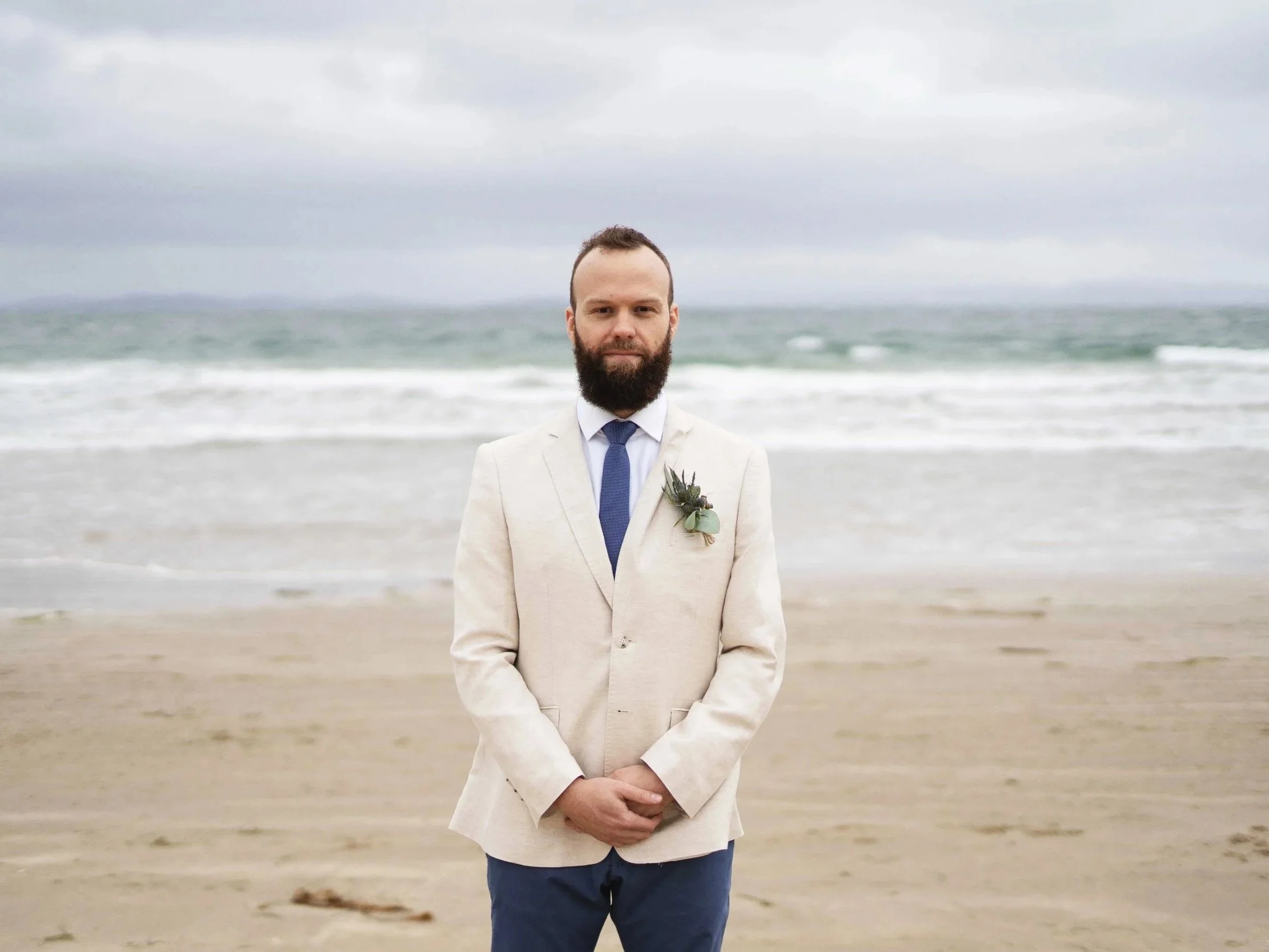Groom solo portrait in Seven Mile Beach Hobart Tasmania Elopement | Randolph Reyes Photography Wedding