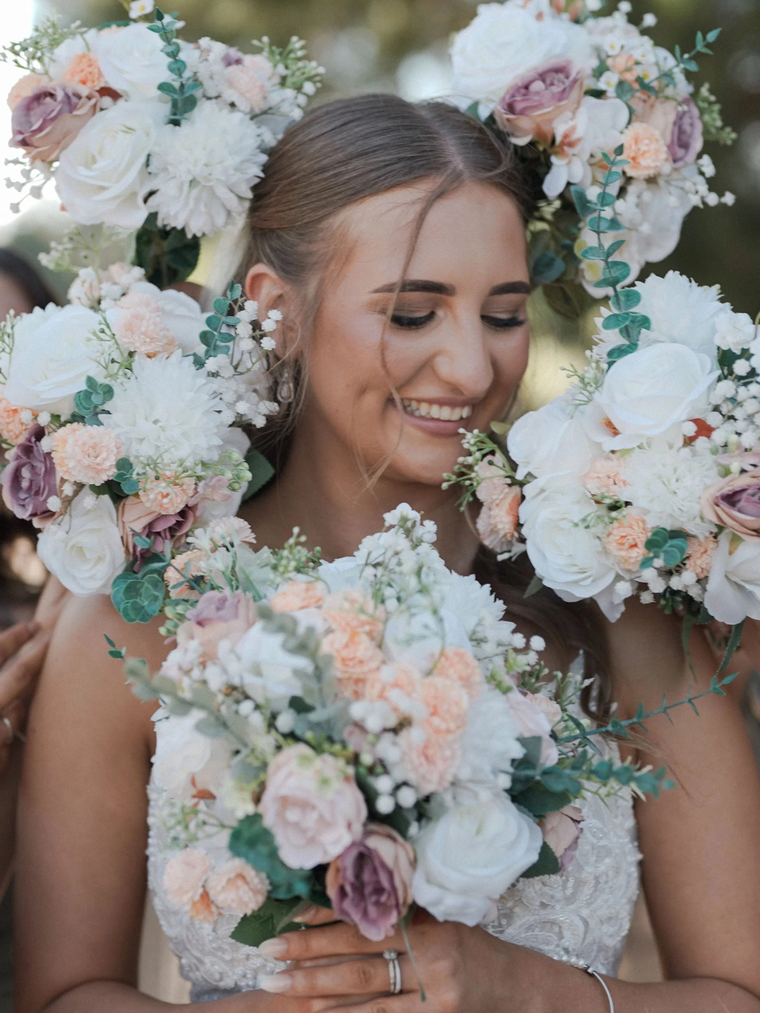 Bride surrounded by bouquet portrait Randolph Reyes Photography