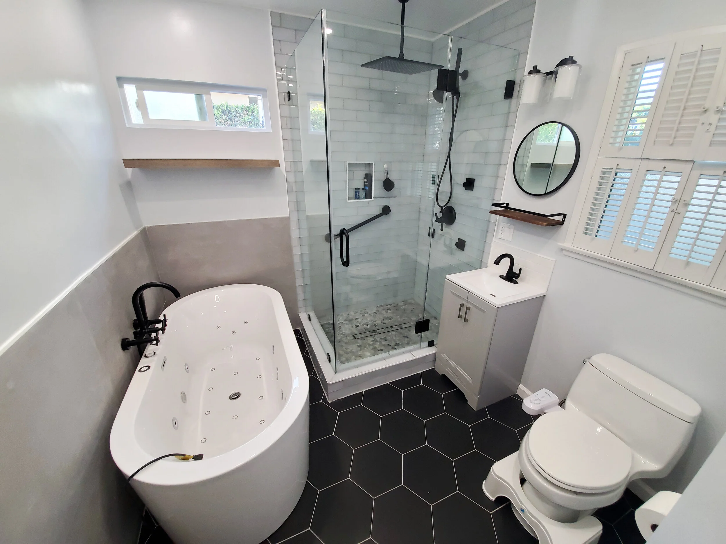 An Elegant Monochrome Designed Bathroom Remodel