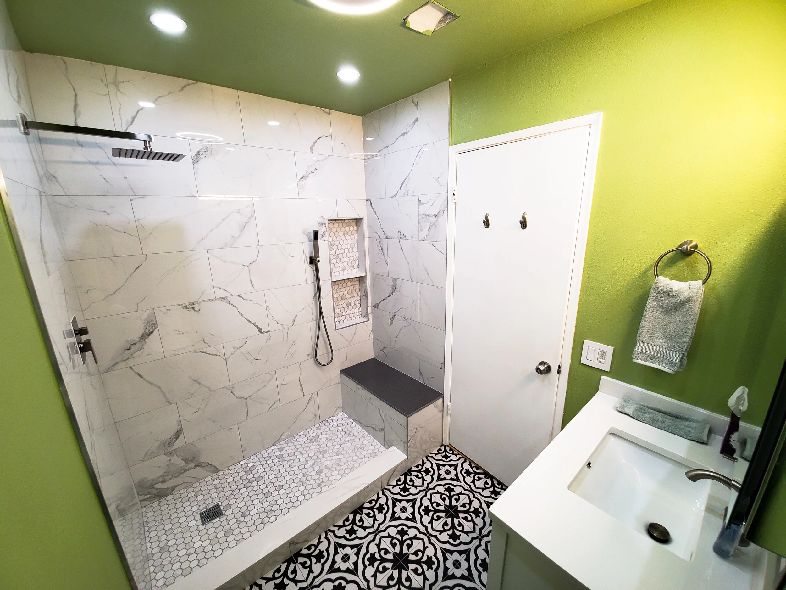 Freshly Green Bathroom Makeover With Mosaic Pattern Flooring