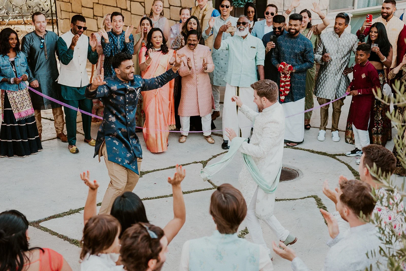Choreographed dances during outdoor wedding celebration