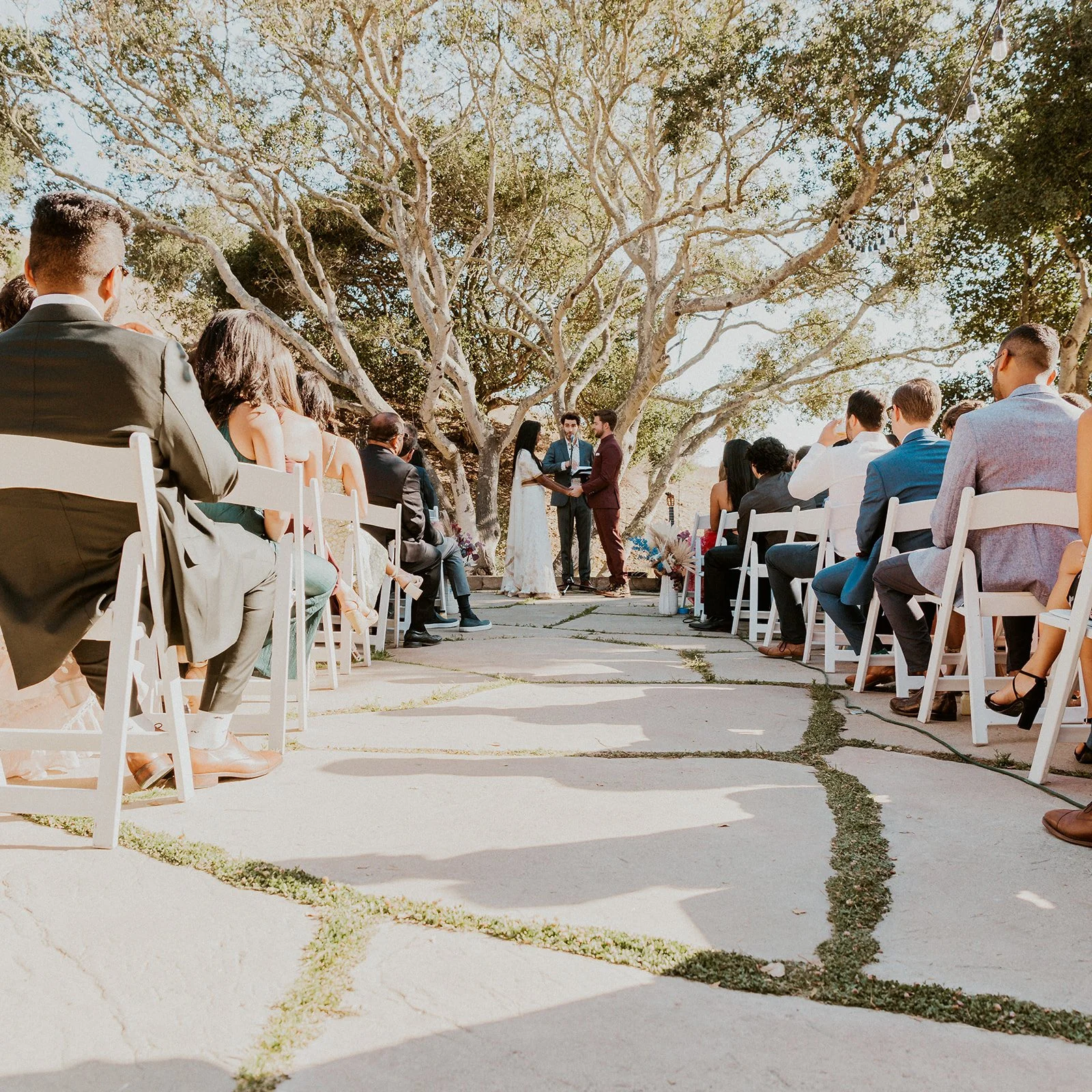 Emotional aisle moment during South Asian fusion wedding ceremony in San Luis Obispo, California