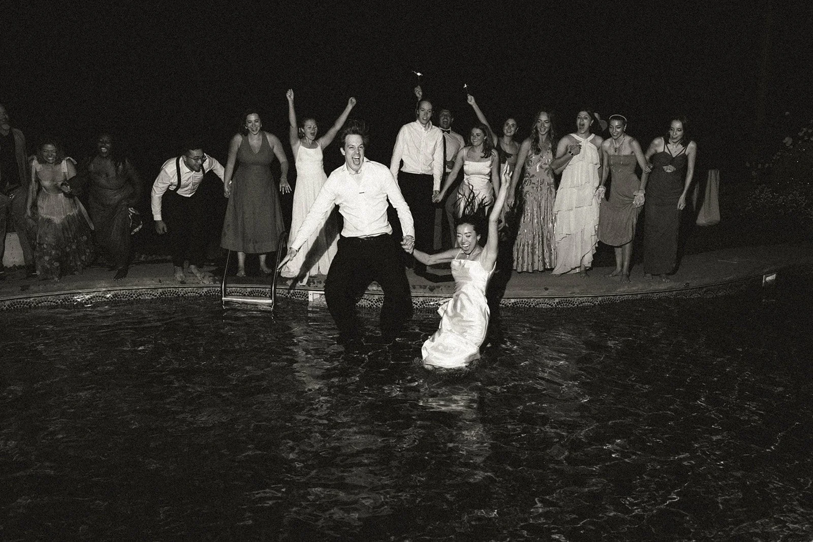 Bride and groom celebrating with family and friends at their Rochester New York wedding