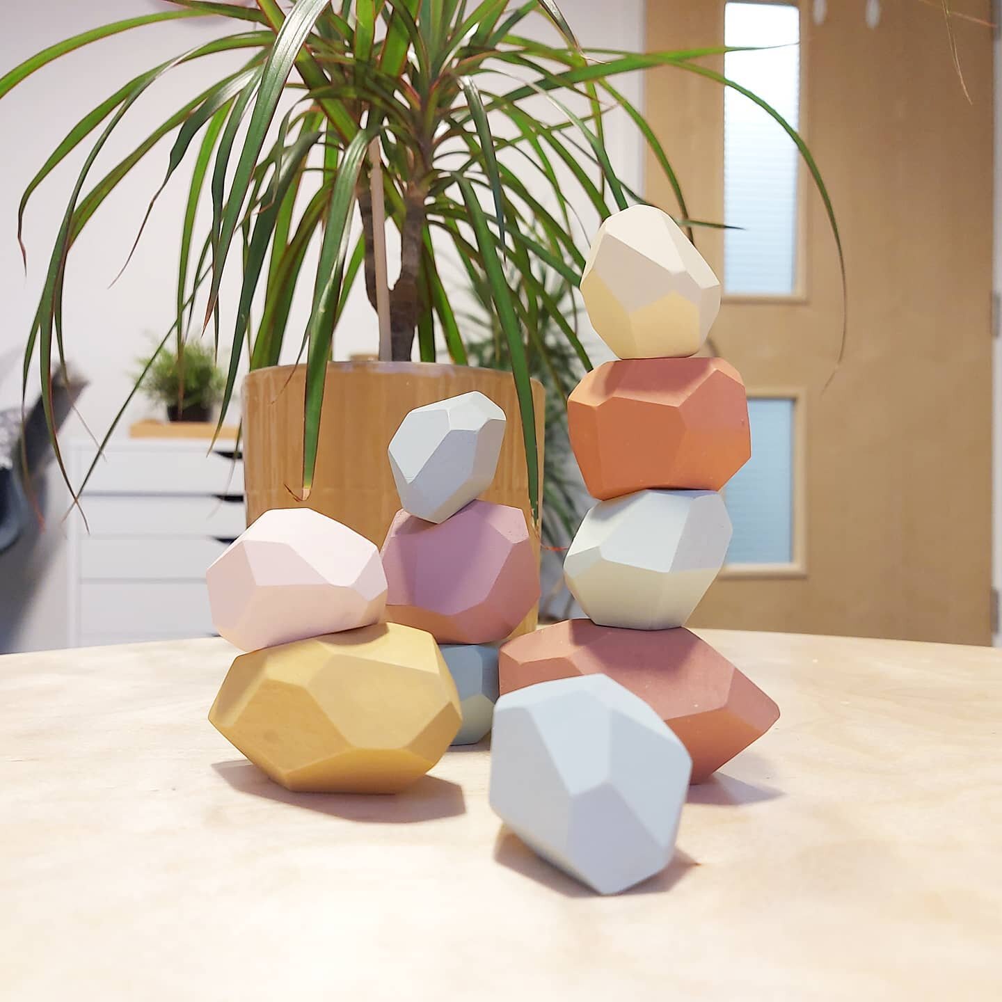 For Christmas I got some beautiful balancing wooden rocks for my little counselling room and I love them! Granted people can't touch them yet because, covid, but they look pretty for now! I have watered my plants and set them up. 

I hope however thi