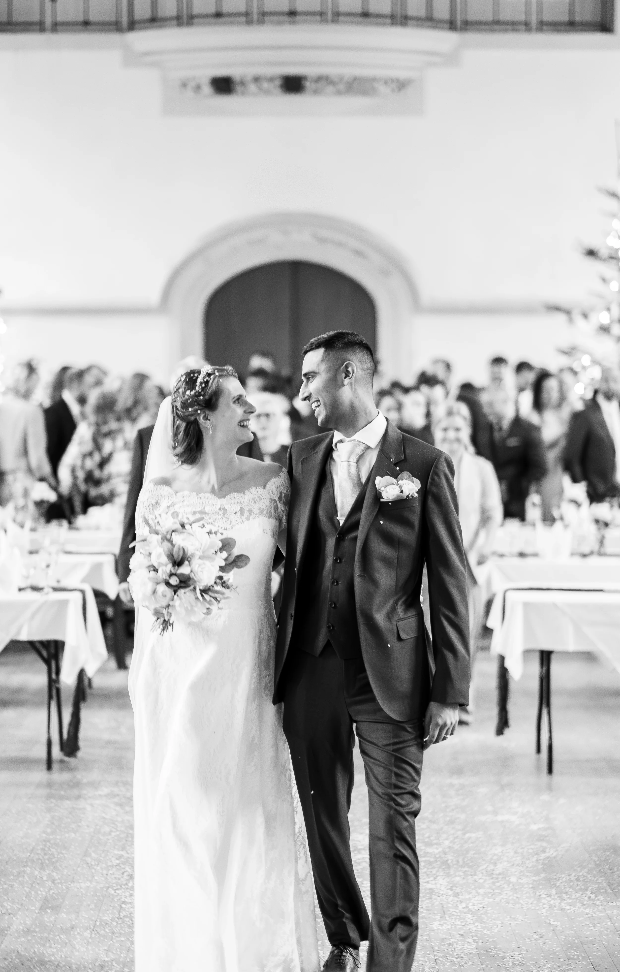 wedding photo of bride and groom on wedding day walking down the aisle-wedding photographer Bedfordshire