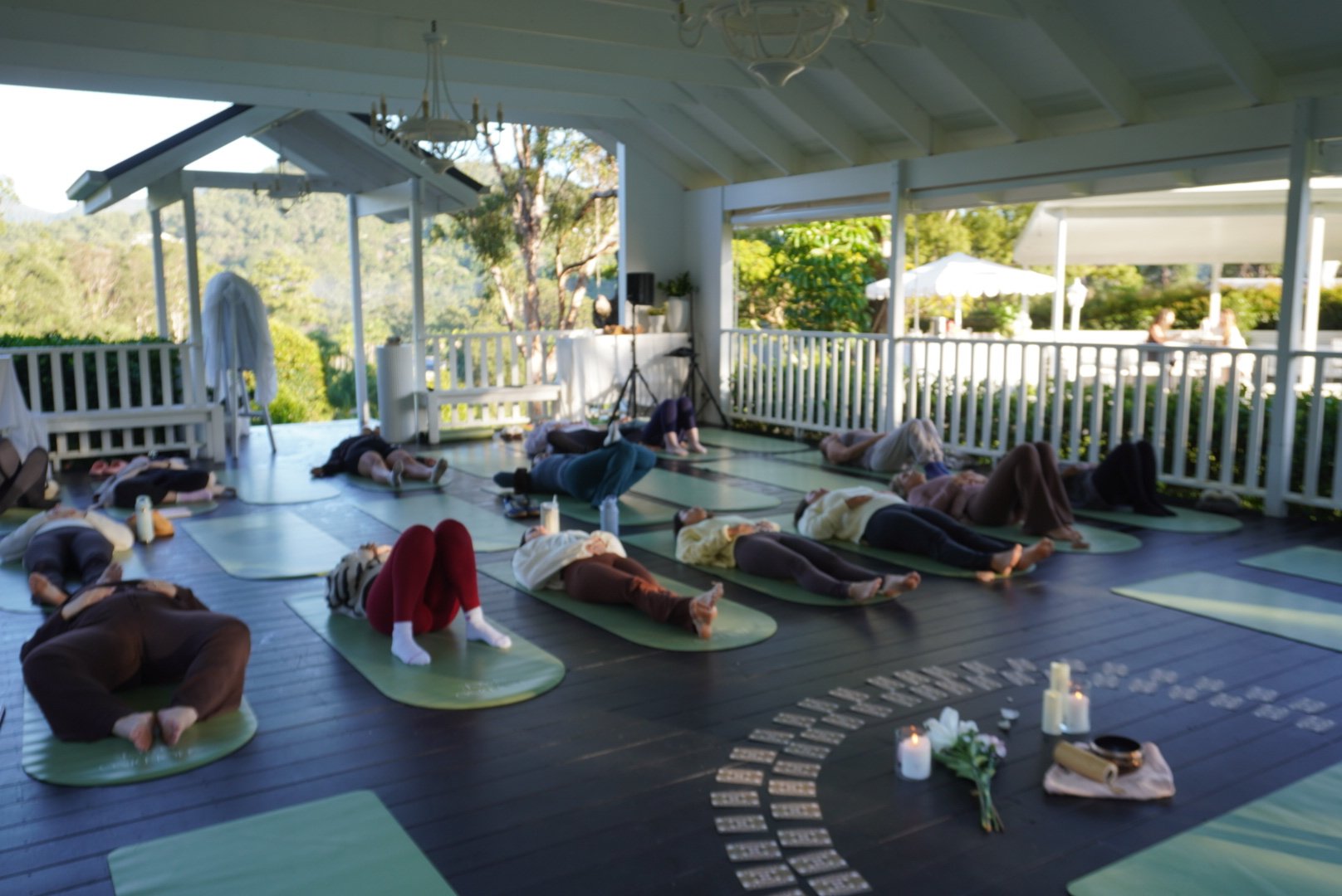 Nadia hosting a private yoga session for a team gathering