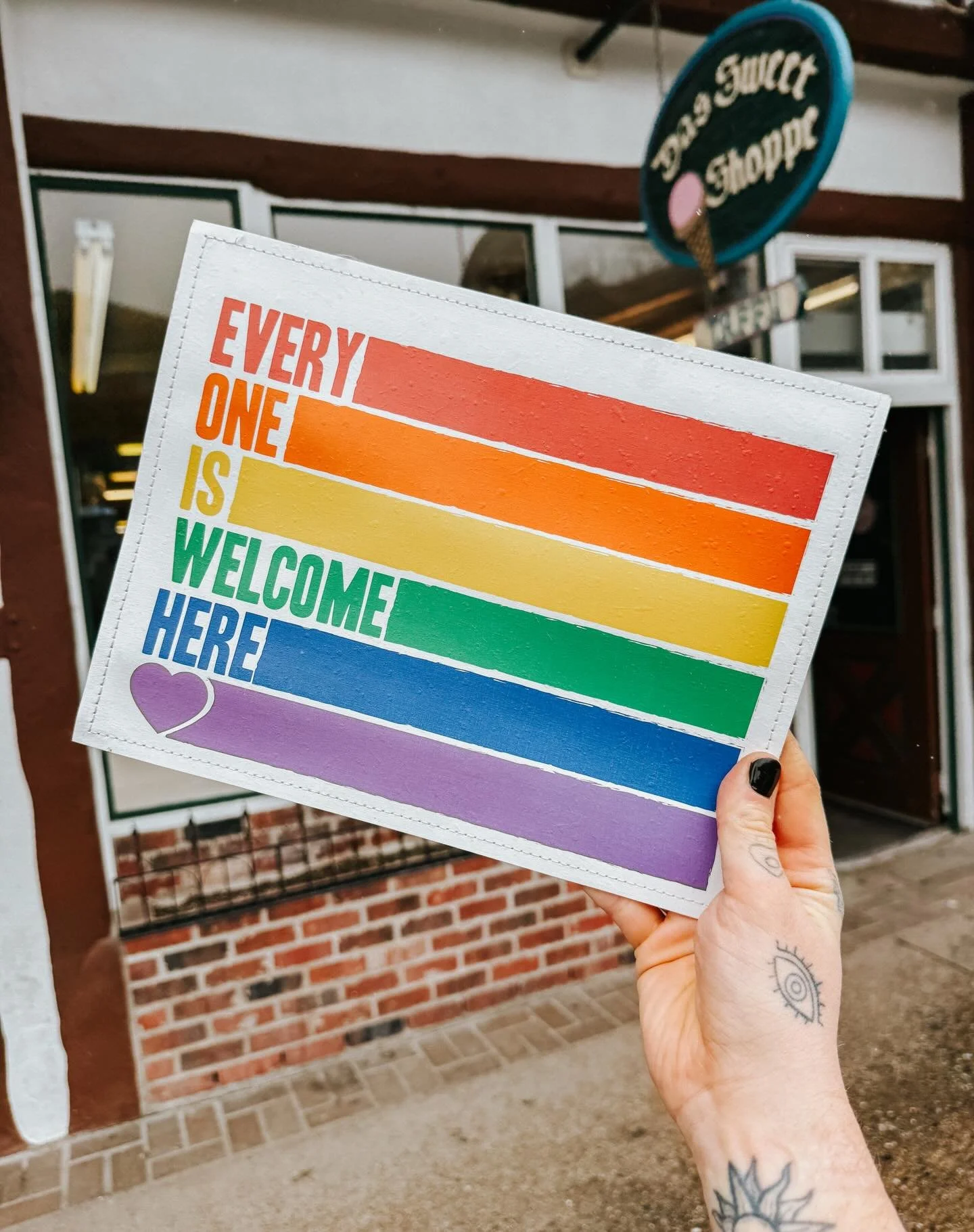 As I was resetting our window display, I was taking down our little signs to clean the windows and forgot this one was tucked in the corner. During all the ugliness and divisiveness in our world, this was a good little reminder to keep your heart ope