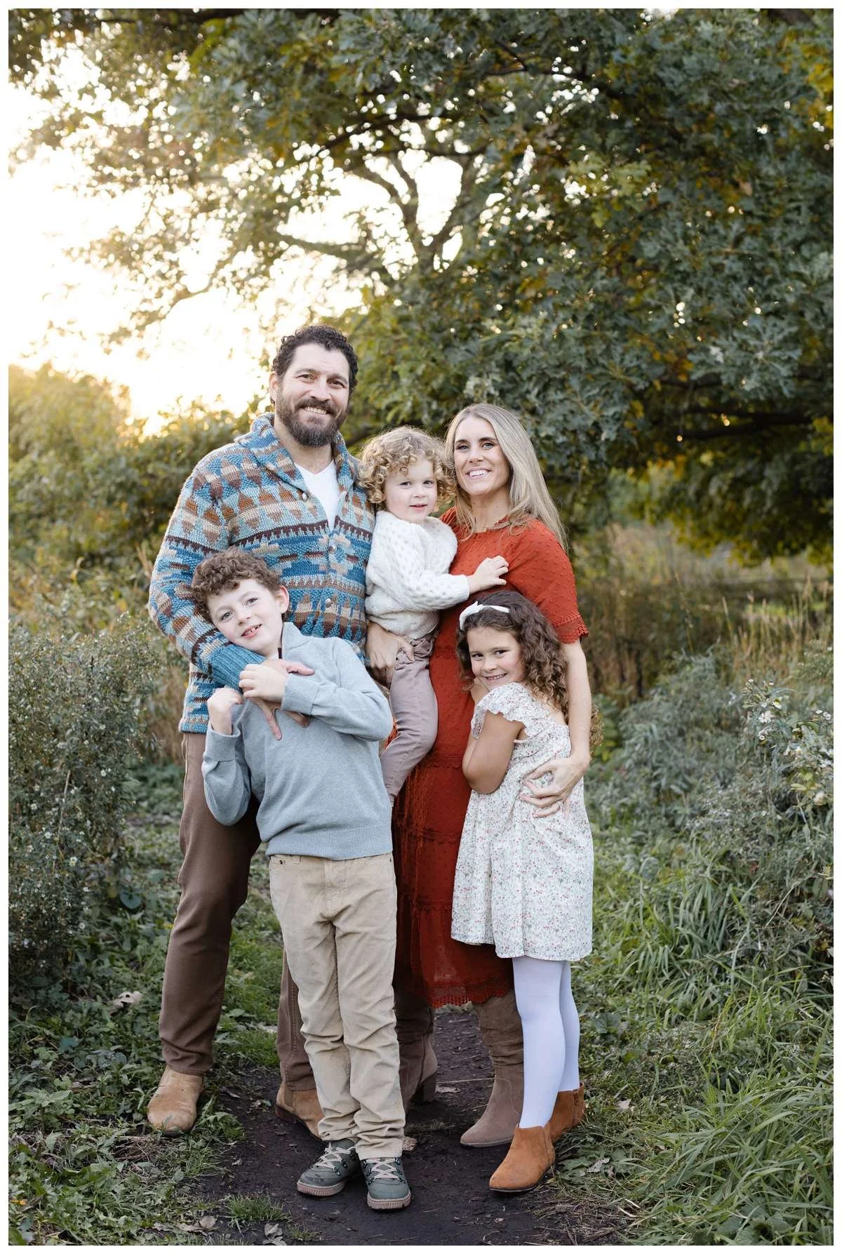 Fall Family Photography session against golden sunset light at Winnemac Park in Chicago
