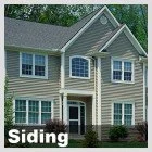 Close-up of a house with siding and multiple windows