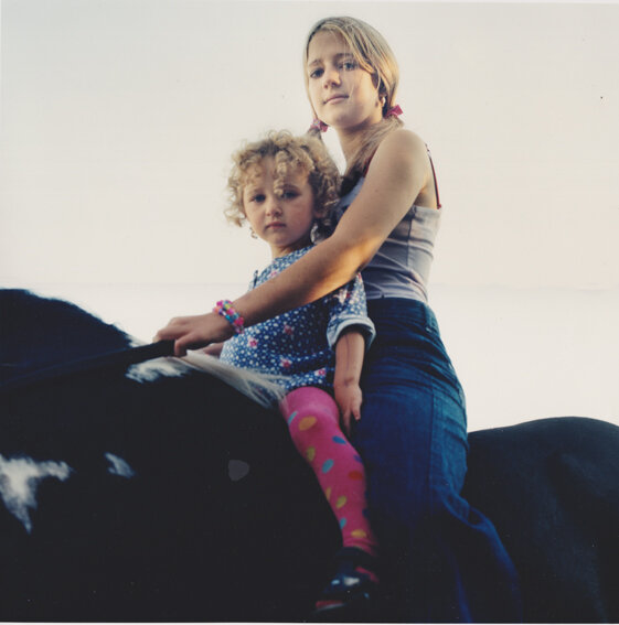 girl and child on horse.jpg