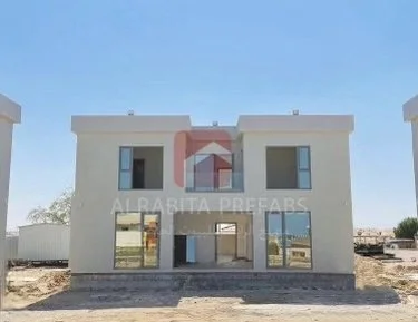 Under-construction modern two-story prefabricated building executed by Alrabita Prefab Co. مبنى جاهز دورين مودرن قيد الانشاء تم تنفيذه من قبل مصنع الرابطة للبيوت الجاهزة